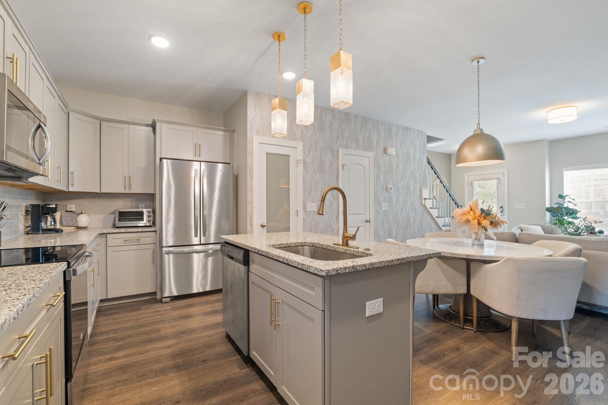 New tasteful accent wall and upgraded pantry door add elegance to the space. - 42 Walnut Springs Drive, Asheville