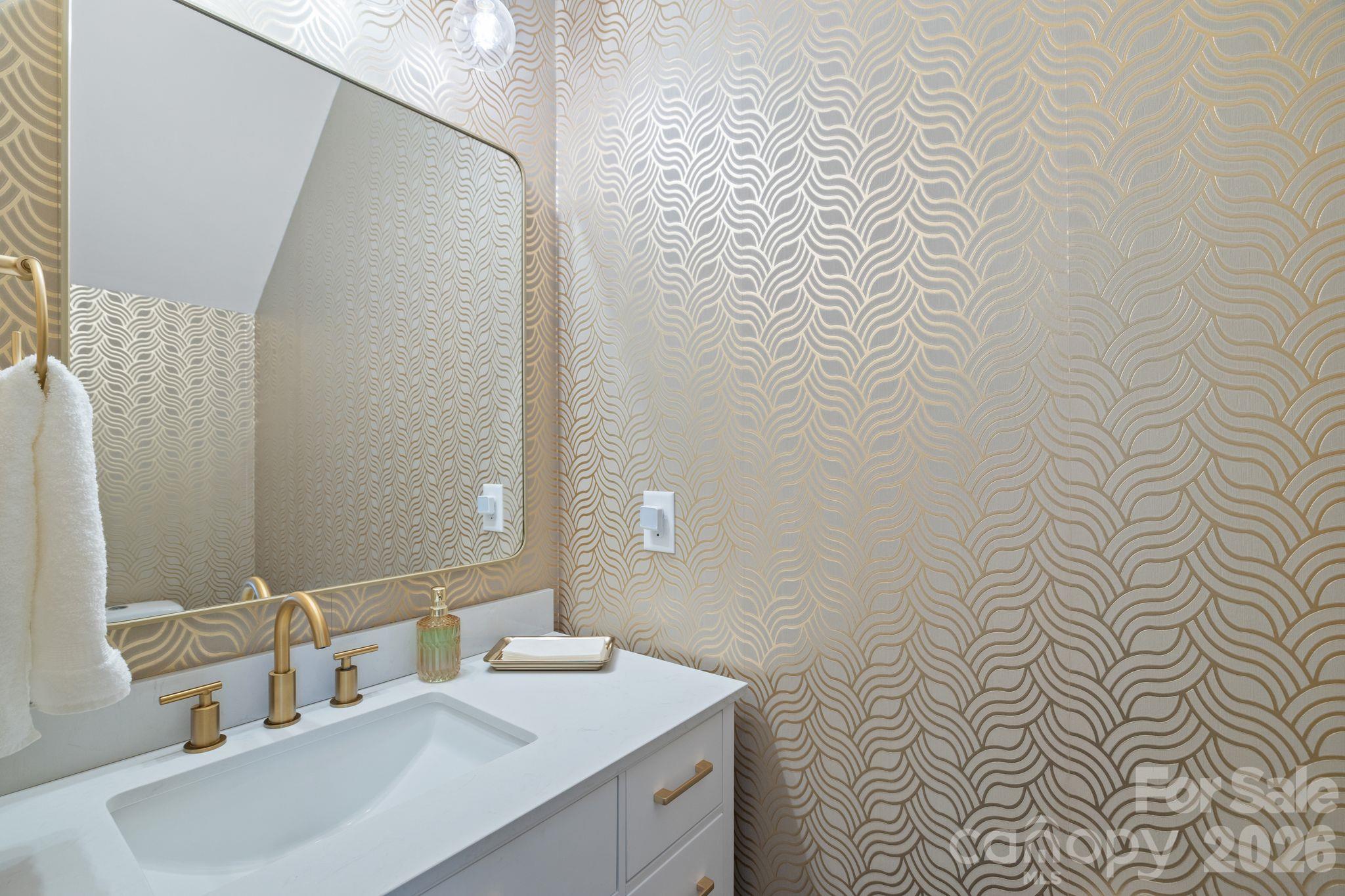 Upgraded vanity, mirror, light fixture and beautiful accent walls in downstairs half bath. - 42 Walnut Springs Drive, Asheville