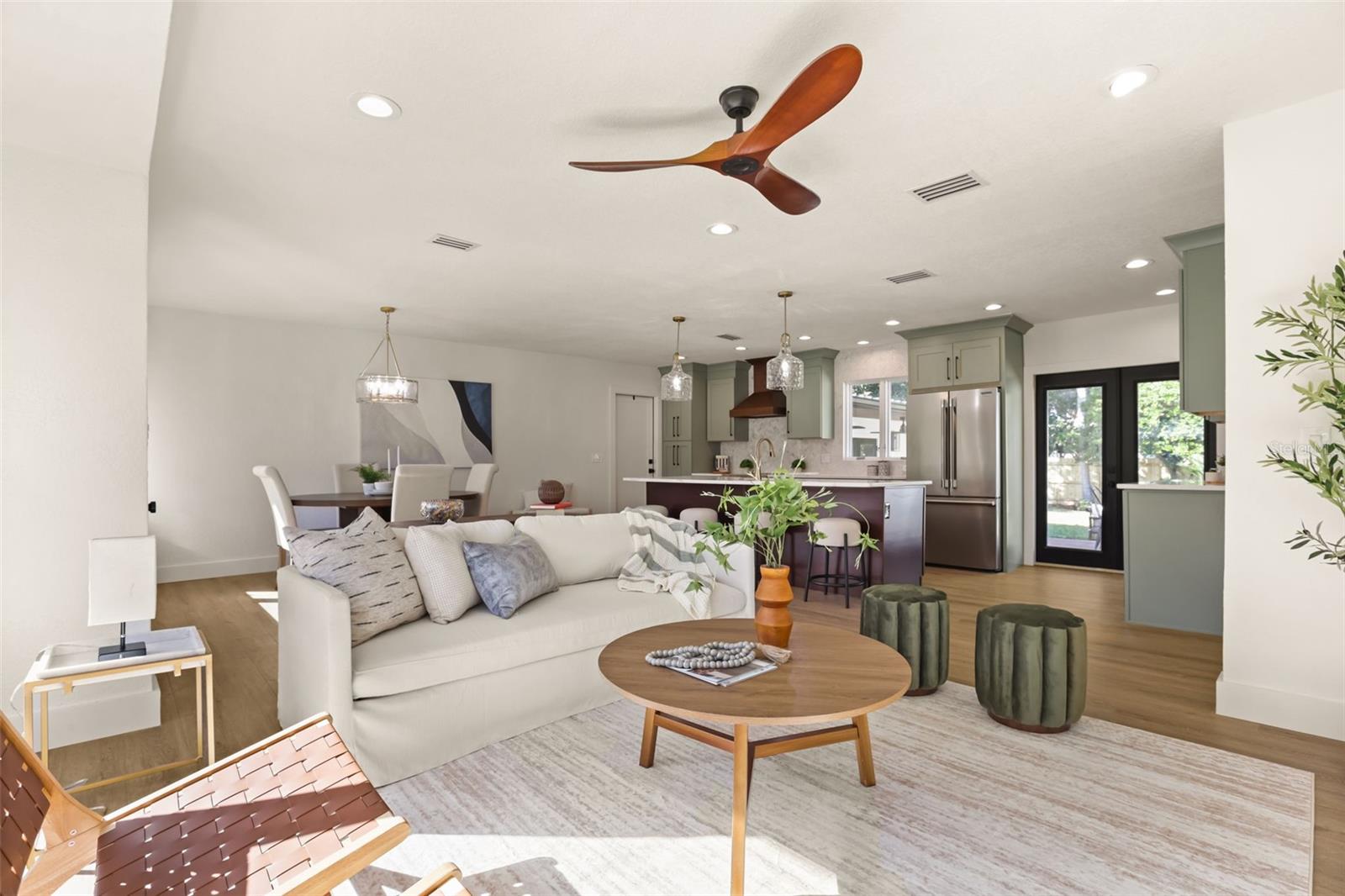 Open concept living with the living, dining room and kitchen flowing seamlessly perfect for families and entertaining. - 512 MAYFAIR CIR, ORLANDO