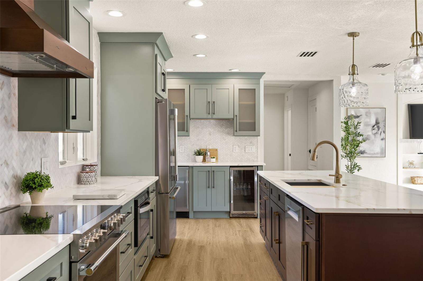 View of coffee/wine bar and Bosch dishwasher and custom cabinetry. - 512 MAYFAIR CIR, ORLANDO