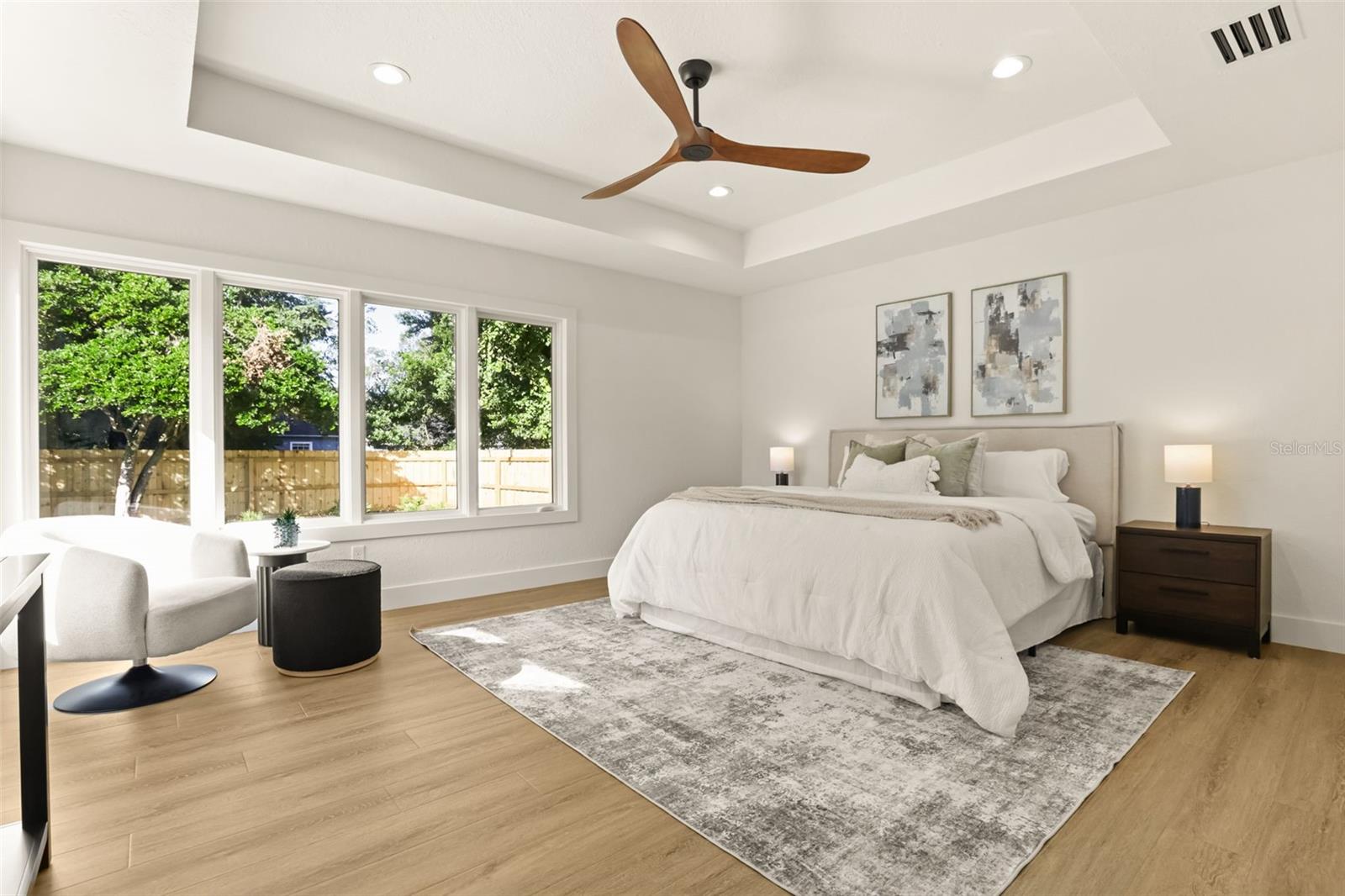 Primary bedroom opening out to your backyard oasis. - 512 MAYFAIR CIR, ORLANDO