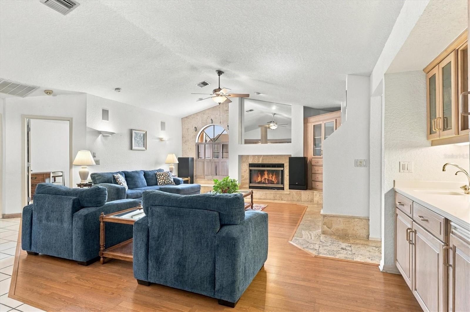 Large Family room with fireplace and wet bar. Perfect for Entertaining and Holiday gatherings! - 175 NORMAN ST, PORT CHARLOTTE