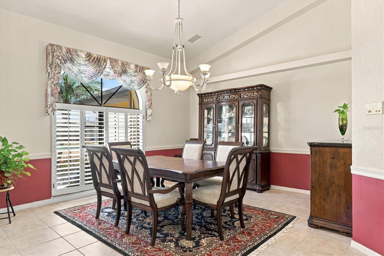 Dining room with planation shutters. - 175 NORMAN ST, PORT CHARLOTTE
