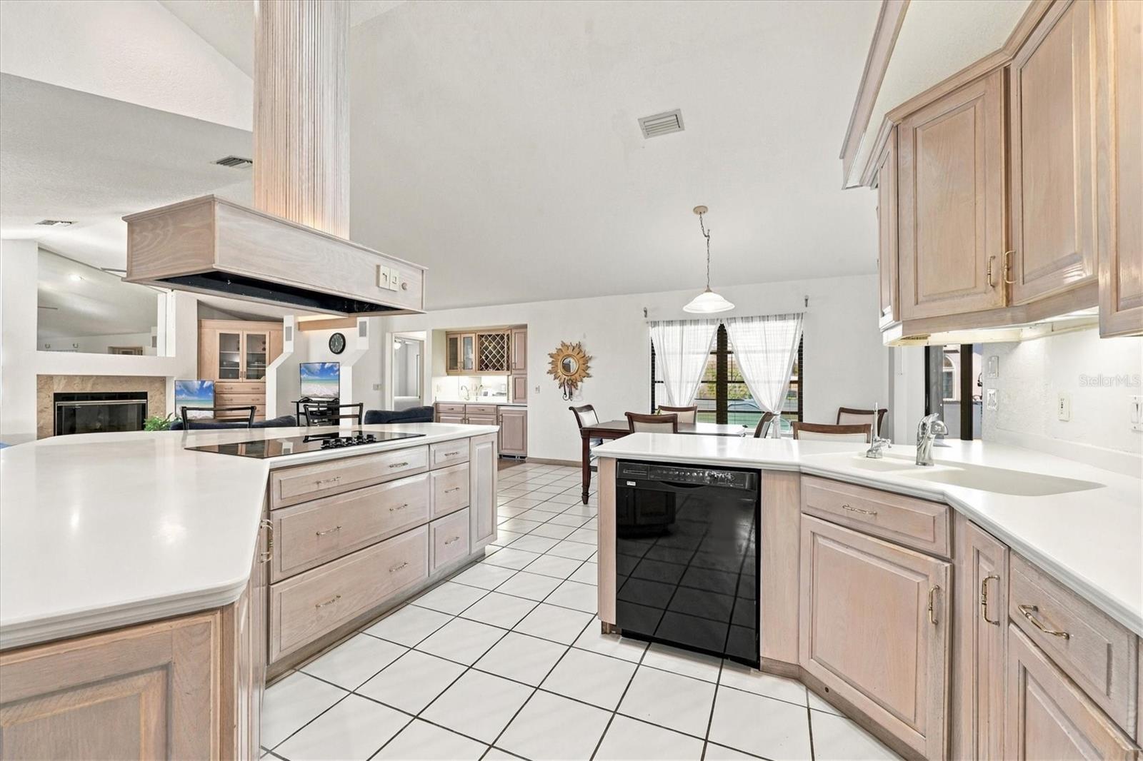 Kitchen has pull out drawers for storage and overlooks the Family Room. - 175 NORMAN ST, PORT CHARLOTTE