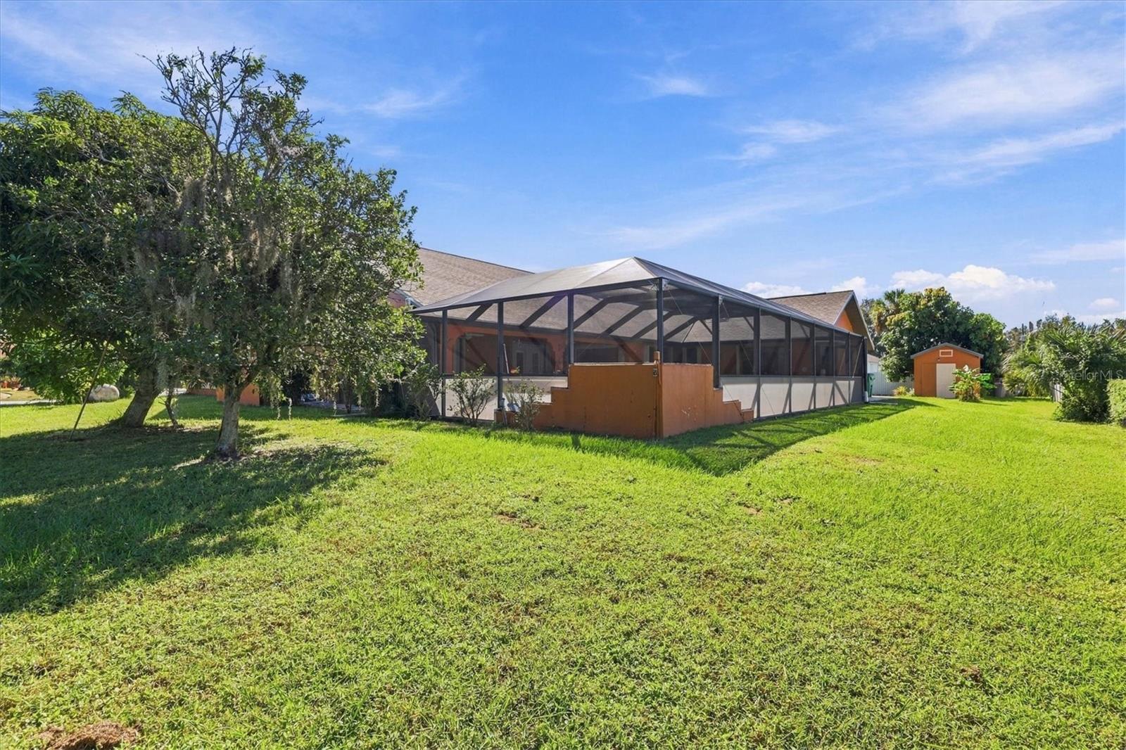 Side yard with lots of room. - 175 NORMAN ST, PORT CHARLOTTE