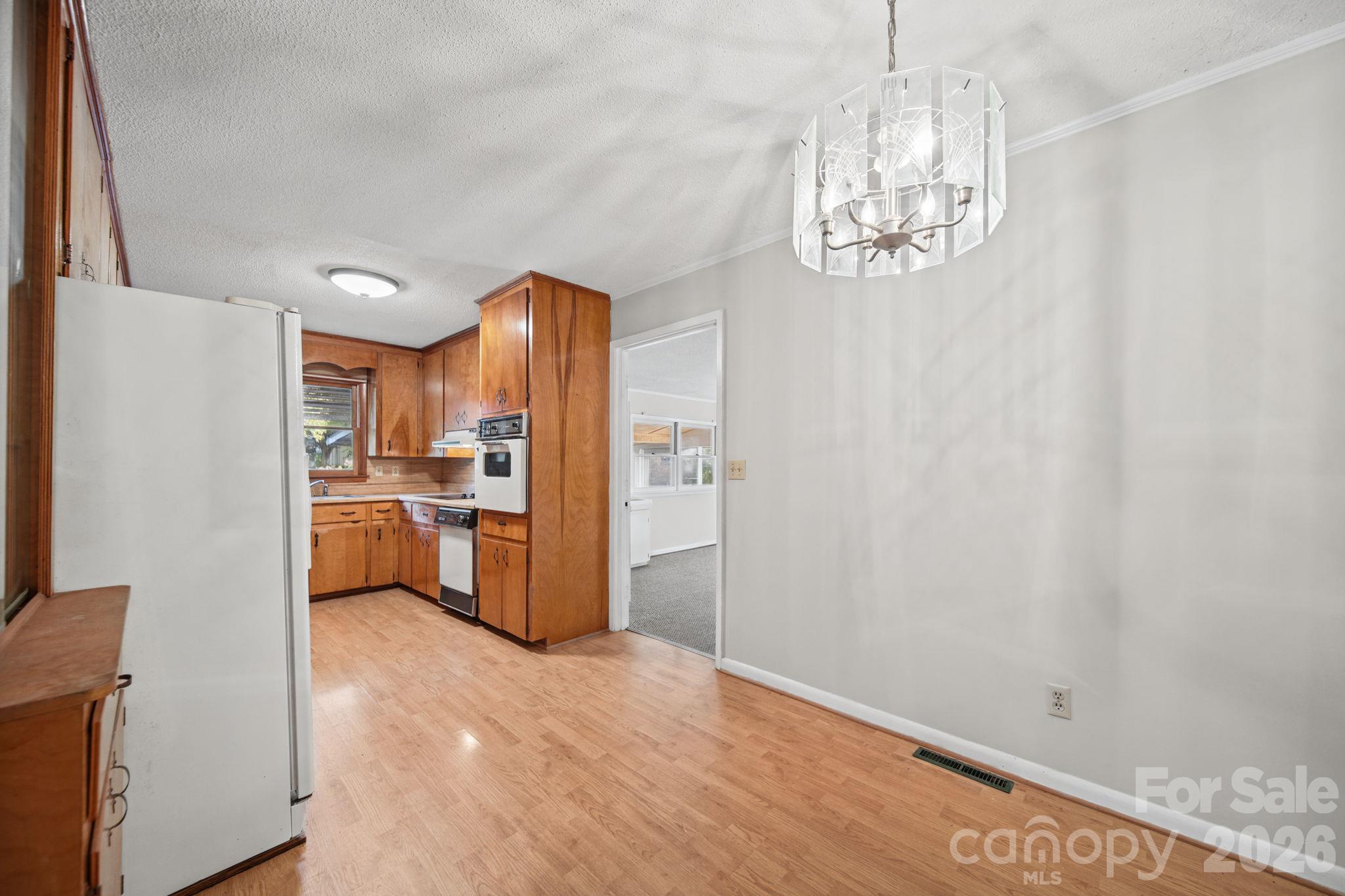 Eat-in galley kitchen. - 220 N Russell Street, Troy