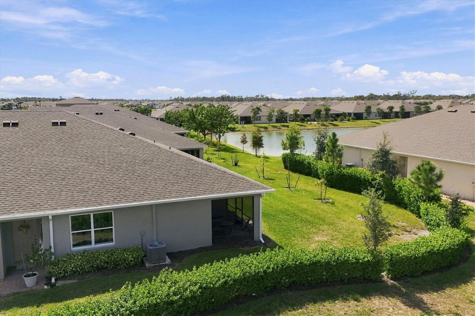 Peek-A-Boo view from the Lanai with Large Corner Lot - 1468 REMINGTON TRACE DR, PORT CHARLOTTE