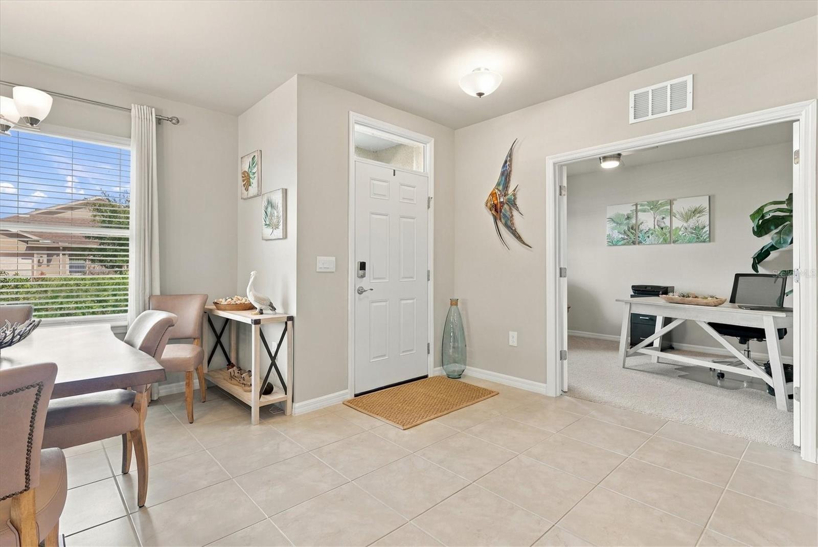Entry Door with Den off to the left and Dining on the right - 1468 REMINGTON TRACE DR, PORT CHARLOTTE