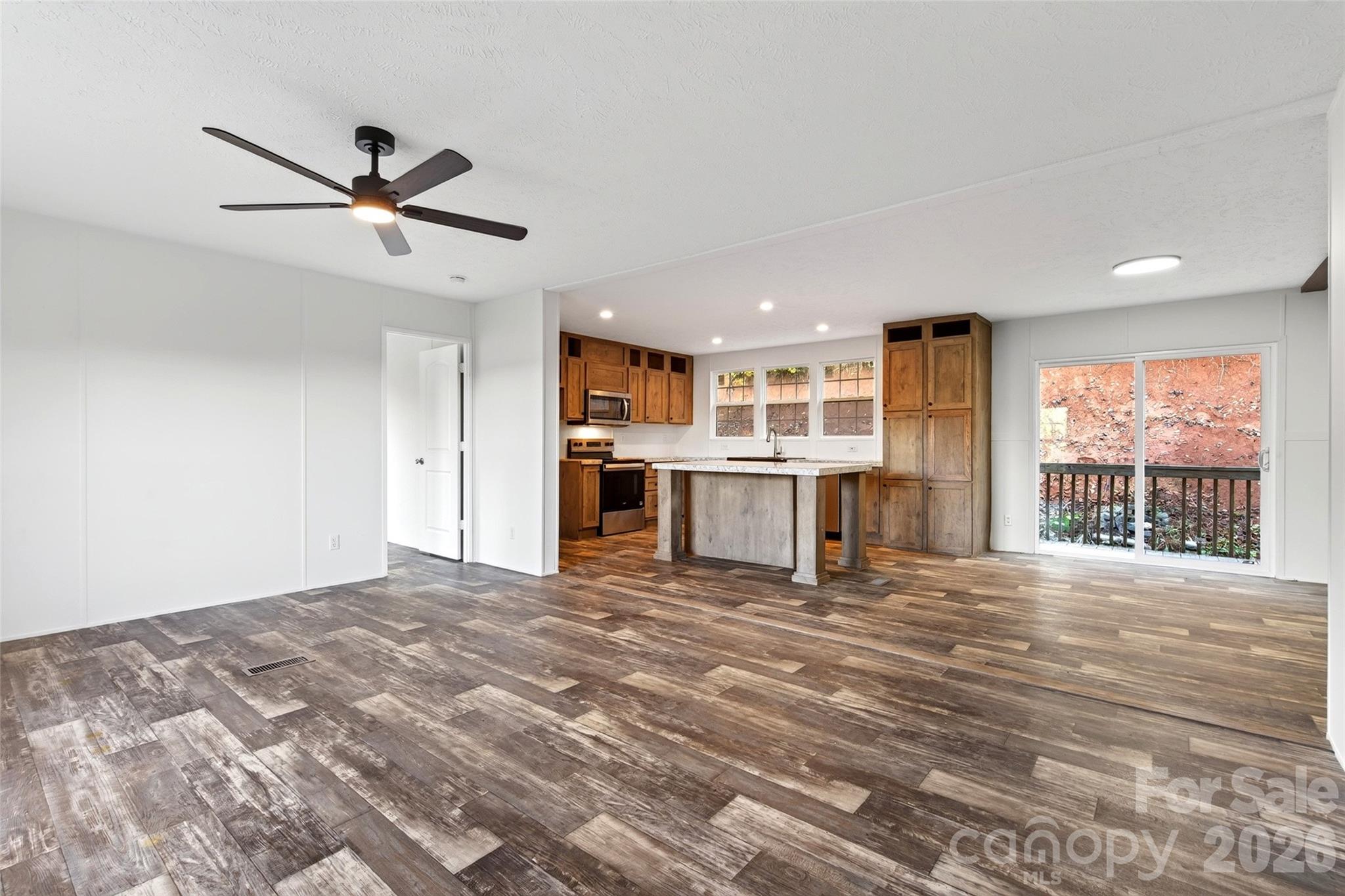 Living Room to Kitchen - 574 Hodges Creek Drive, Old Fort