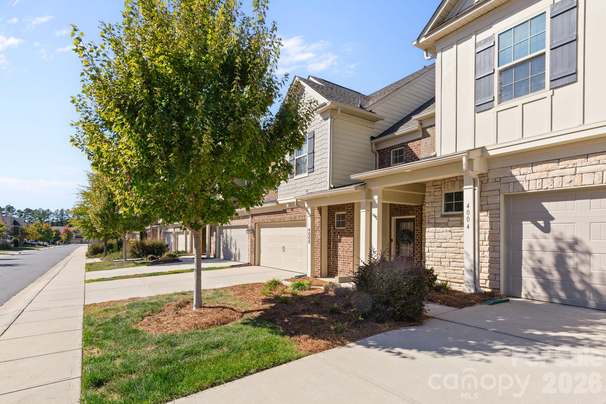 Welcoming entry with 2 car garage & large driveway - 4008 Woodsmill Road, Lancaster