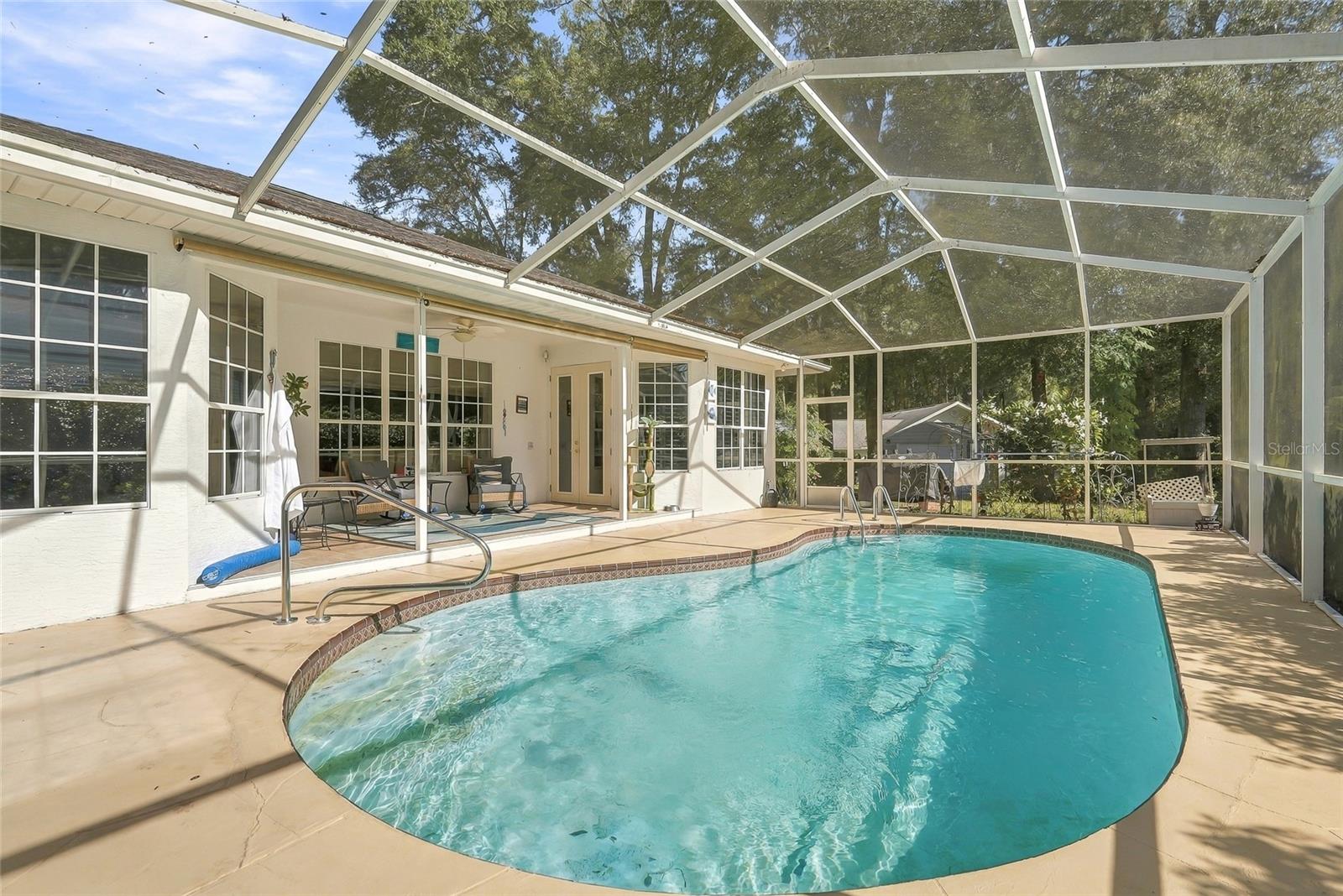 Screened in lanai with In-ground Heated POOL - 19480 SW 94TH ST, DUNNELLON