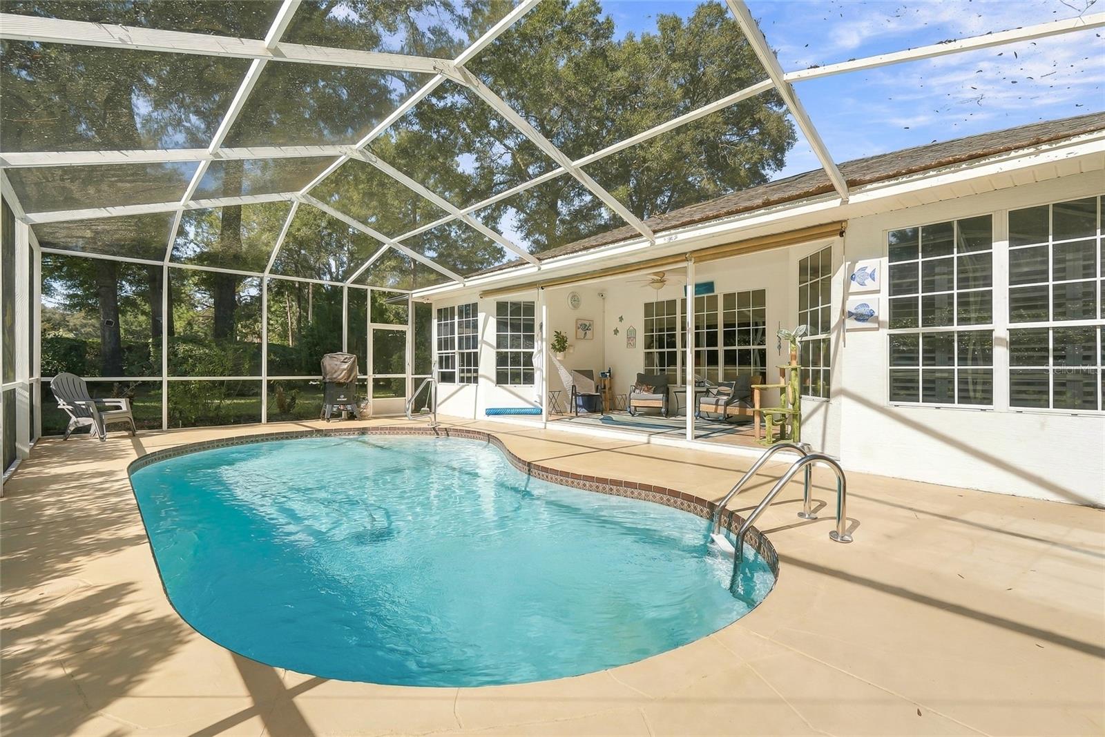 Screened in lanai with In-ground Heated POOL - 19480 SW 94TH ST, DUNNELLON