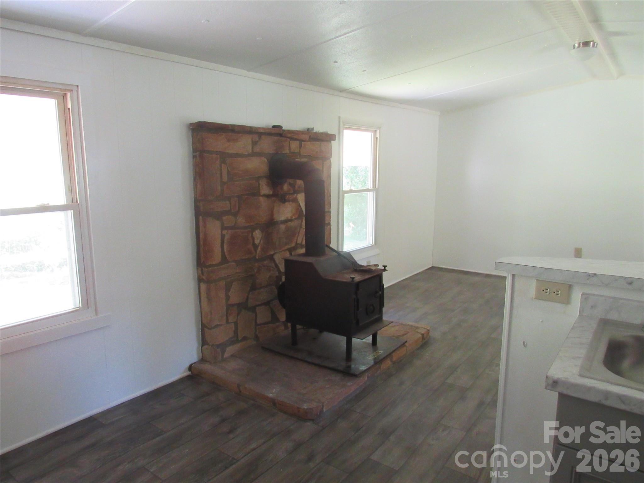 Woodstove in LR - 664 Woodfin Road, Sylva
