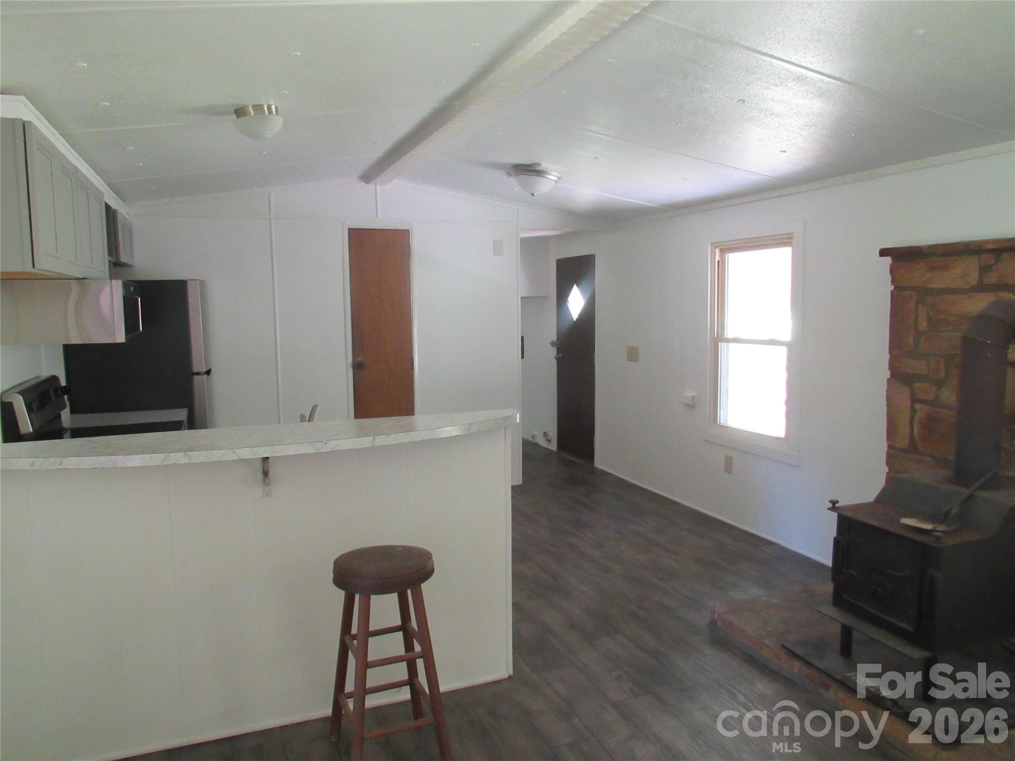 Bar in between Kitchen and LR - 664 Woodfin Road, Sylva