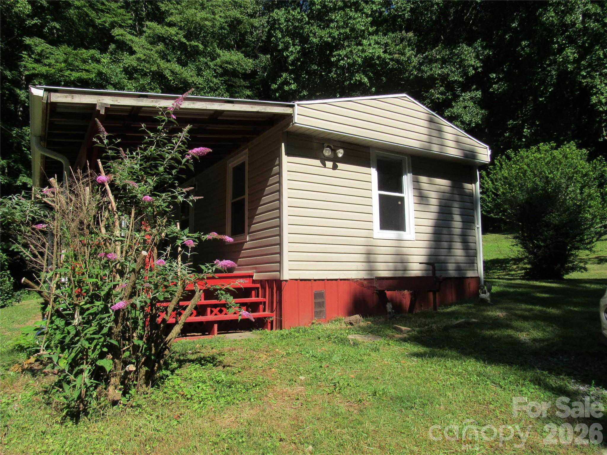 Side of home - 664 Woodfin Road, Sylva