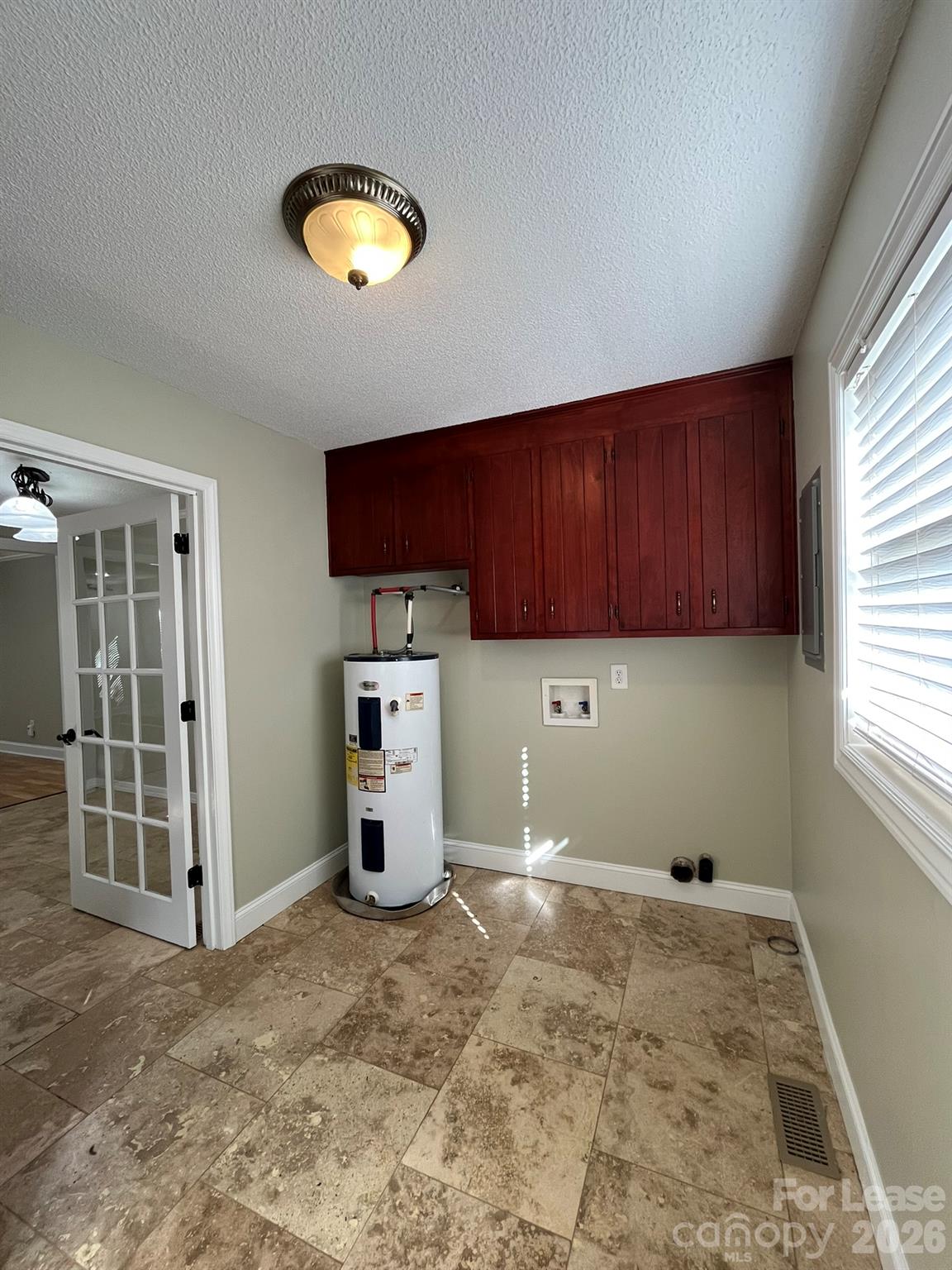 Laundry Room Off Kitchen - 3008 Fincher Road, Matthews