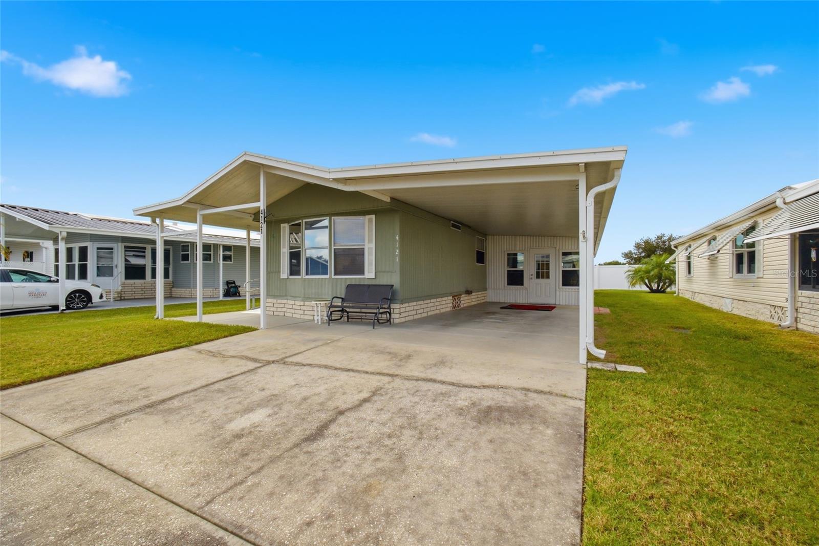 Manufactured Home at 4121 JOYFUL LN, ZEPHYRHILLS, photo 3 of 31