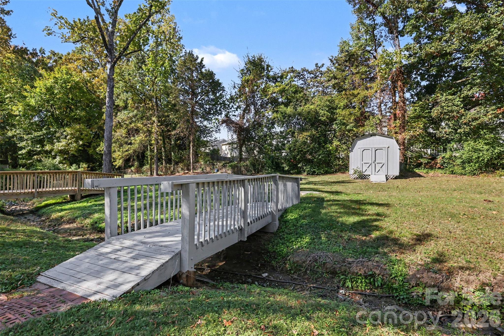 Beautiful backyard with bridge and storage shed - 1801 Dallas Avenue, Charlotte