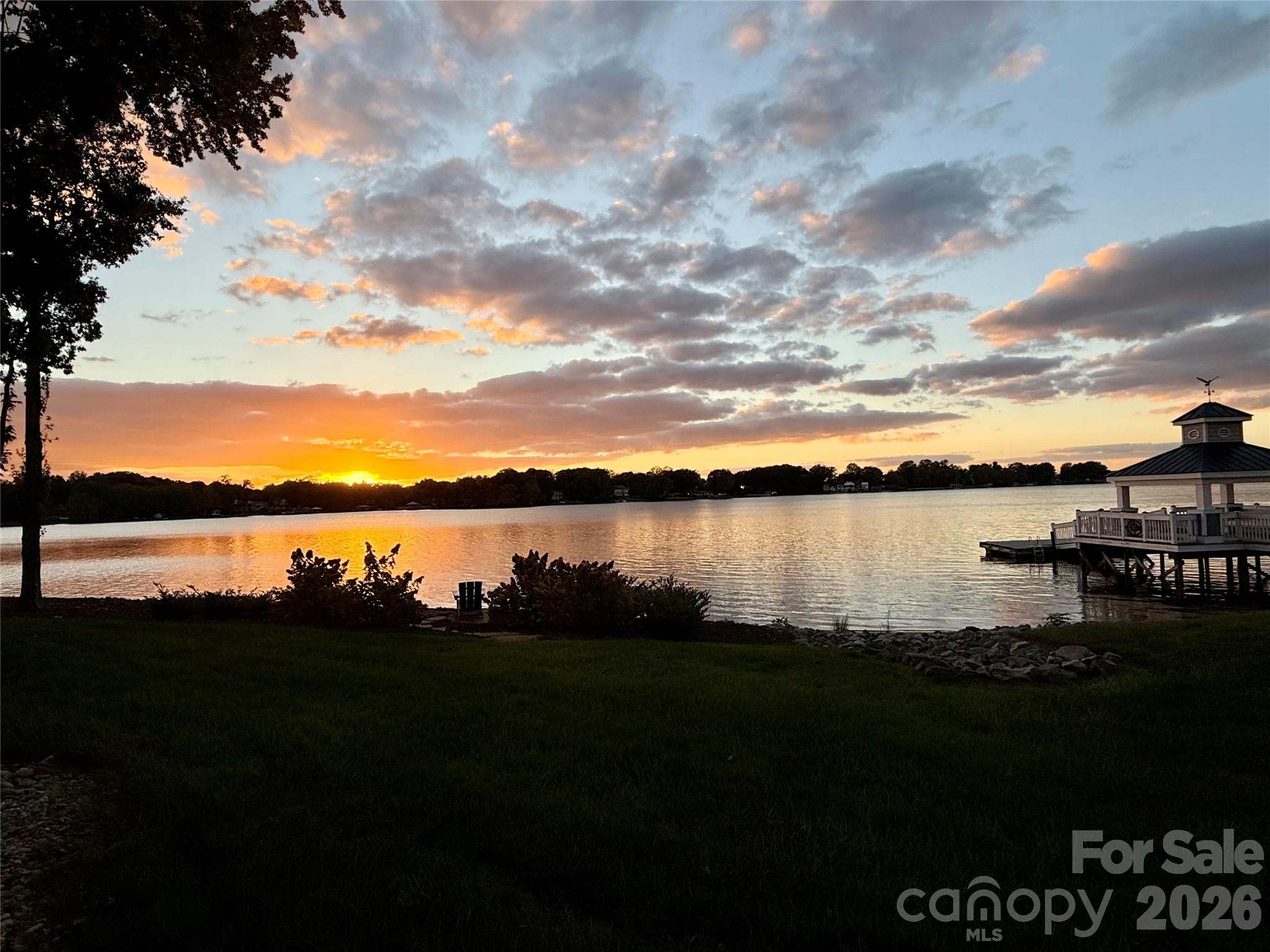 Picture yourself winding down the day with a glass of wine, watching the sun slowly set over Lake Norman as the sky fills with BREATHTAKING colors. Sunsets like these NEVER get old! I could definitely get used to ending my evenings right here! - 928 Southwest Drive, Davidson