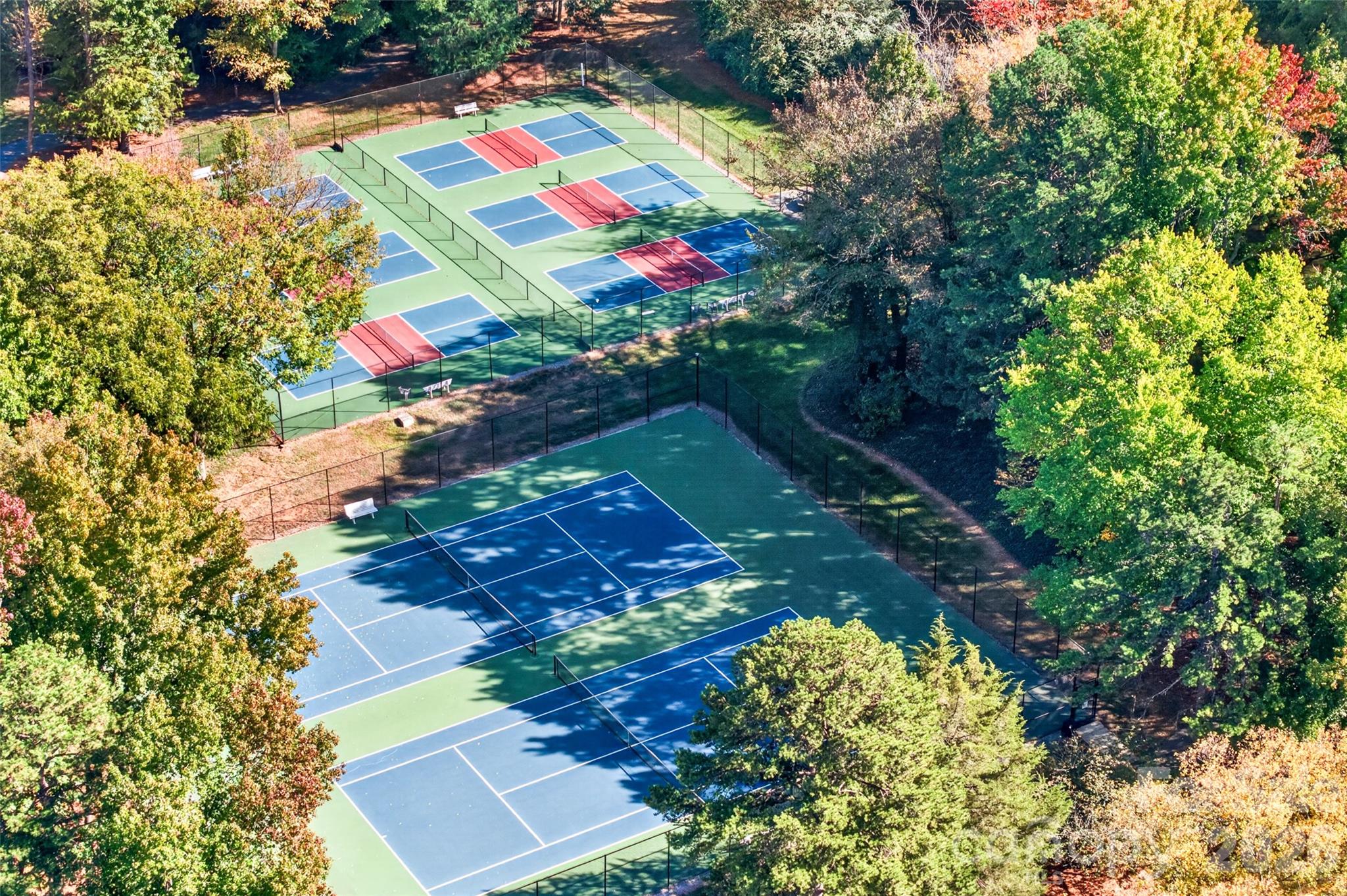 Community pickleball and tennis courts, plus beautiful walking trails throughout Davidson Landing! Whether you enjoy a friendly match or a peaceful stroll along Lake Norman, there are plenty of ways to stay active and enjoy the outdoors in this wonderful community! - 928 Southwest Drive, Davidson
