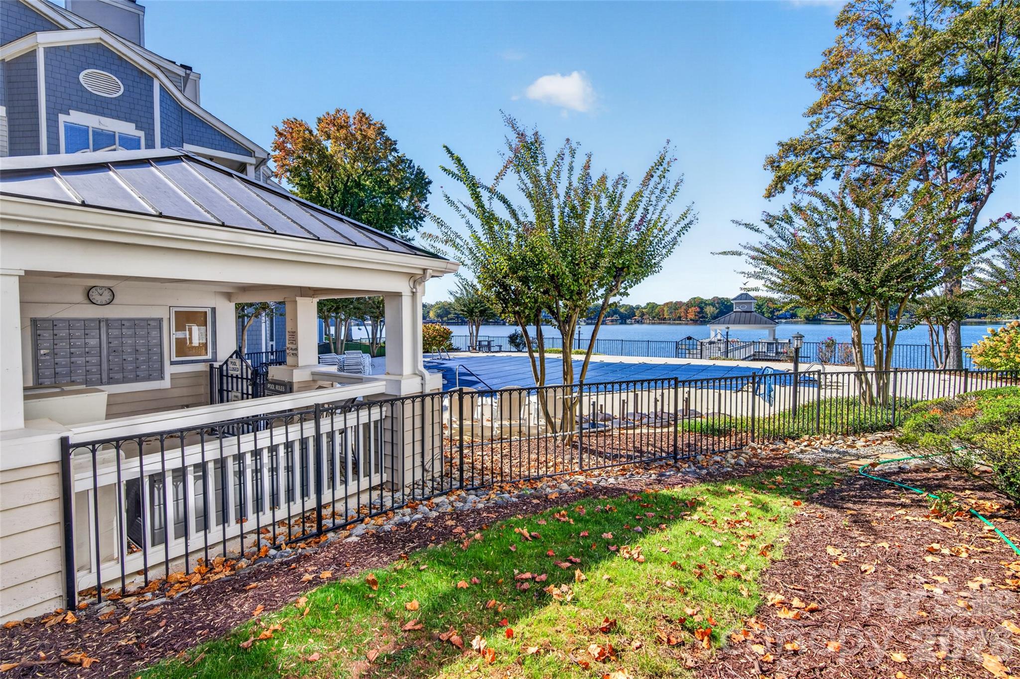 Conveniently located community mail kiosk and entrance to the beautiful waterfront pool! - 928 Southwest Drive, Davidson