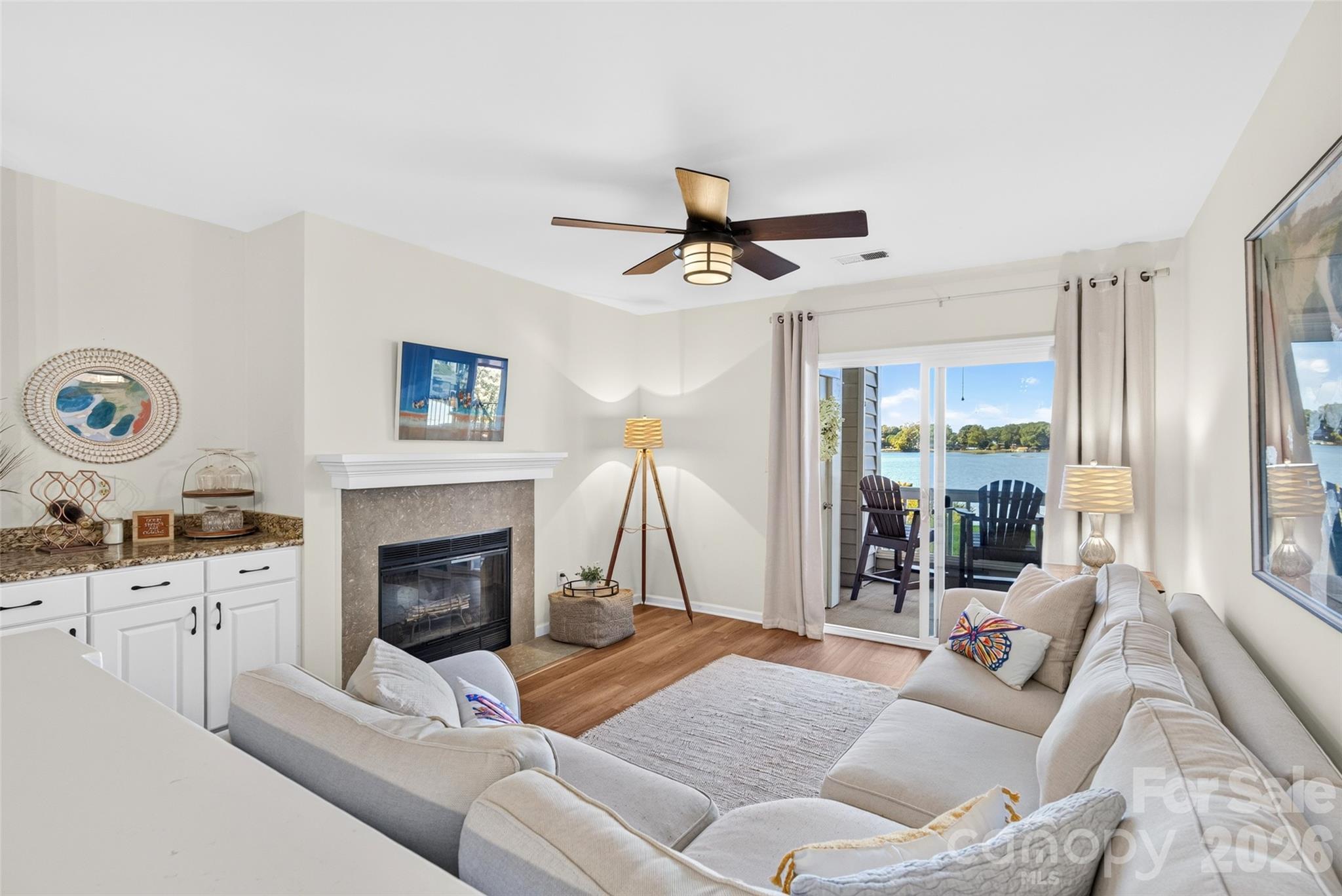 Cozy fall and winter evenings snuggled up by the wood-burning fireplace, watching the most BEAUTIFUL sunsets over Lake Norman! Does it get any better than this?! - 928 Southwest Drive, Davidson