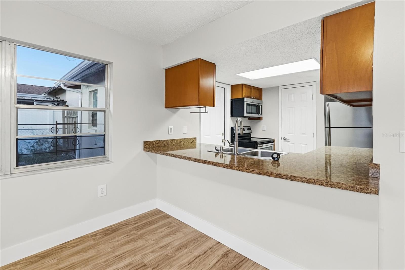 Single Family Residence at 5051 BROOKSIDE LN, NEW PORT RICHEY, photo 6 of 18