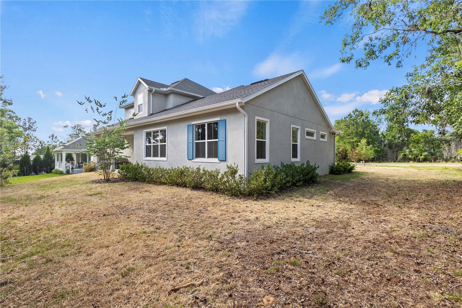 Back Exterior - 6622 SUMMIT VIEW DR, BROOKSVILLE