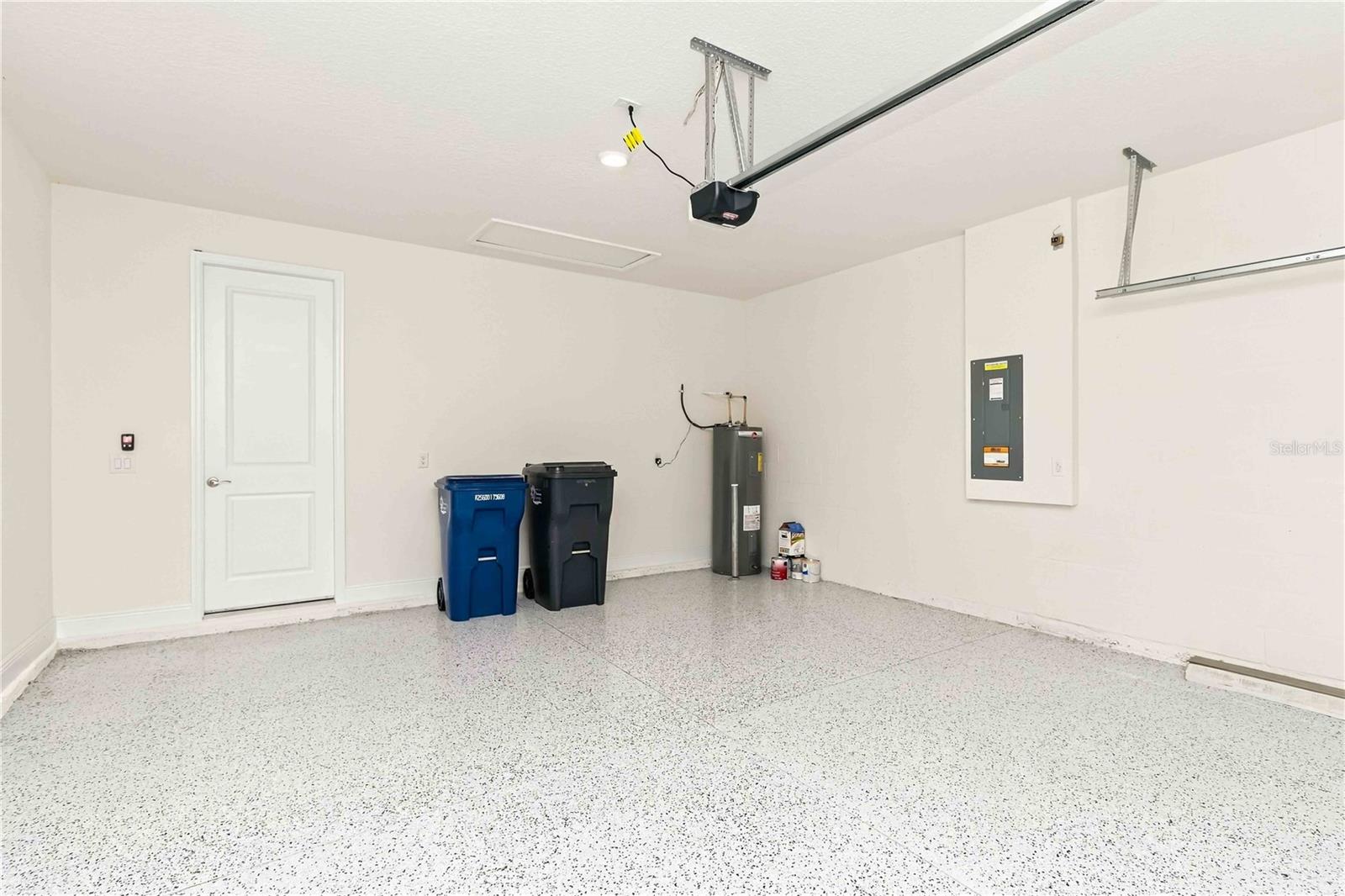 Garage with epoxy floors - 9136 GULF HAVEN DR, PARRISH