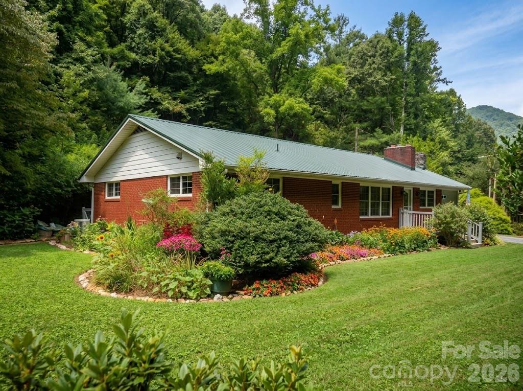 One level living, 4 Bedrooms and 2 Full Baths Renovated Brick home on 10 acres with creek, well and spring - 3829 Coxes Creek Road, Burnsville