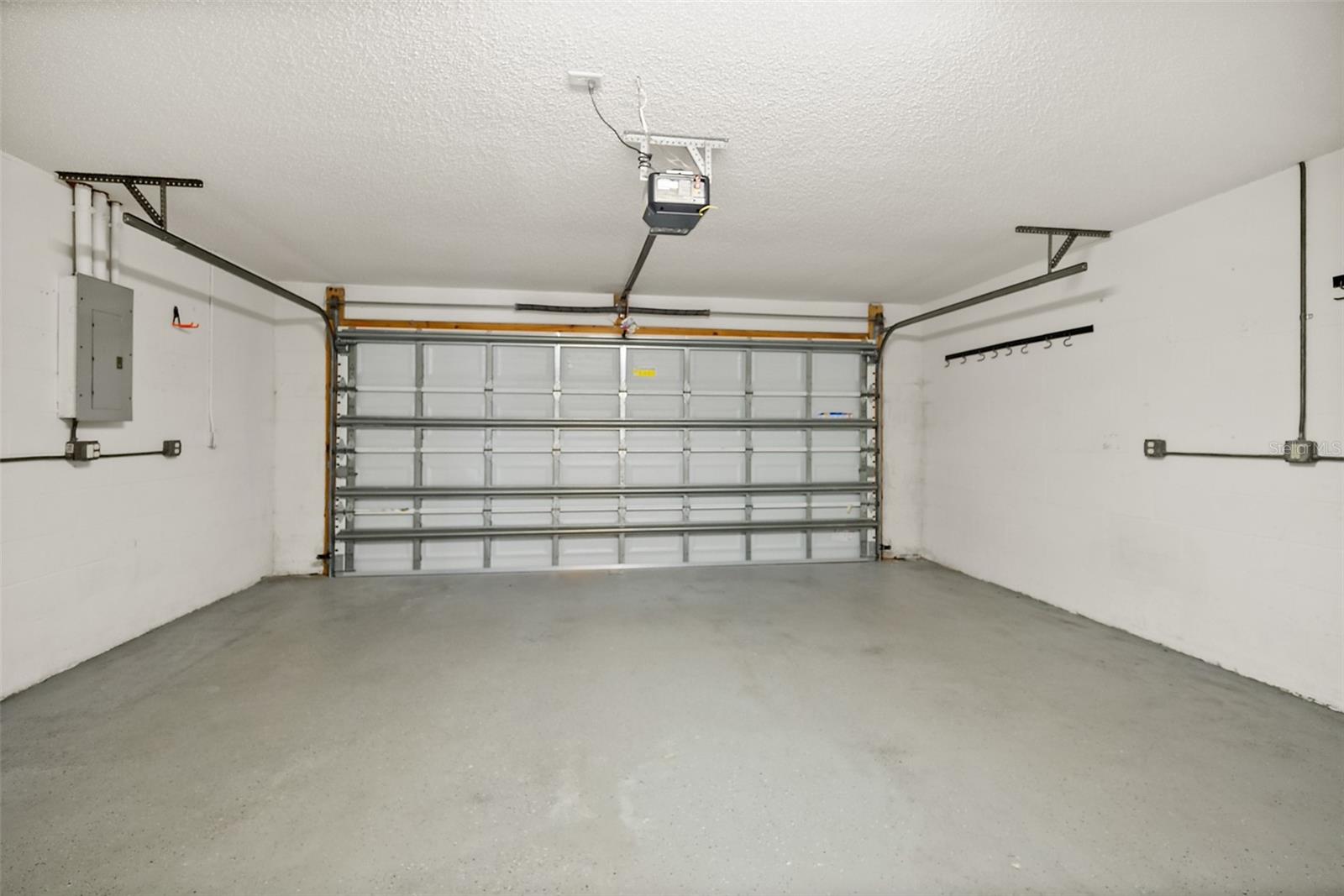 2 Car Garage - 16 SLUMBER MEADOW TRL, PALM COAST