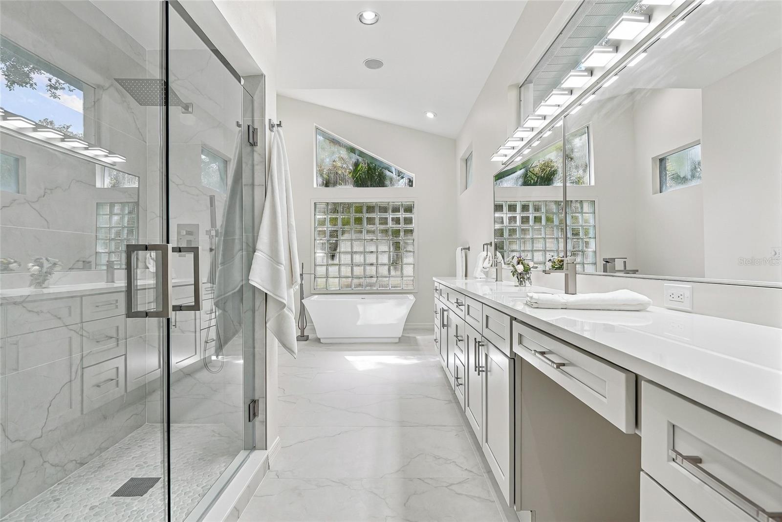 Recently updated primary bath creates a spa environment. - 1101 DARLINGTON OAK DR NE, ST PETERSBURG