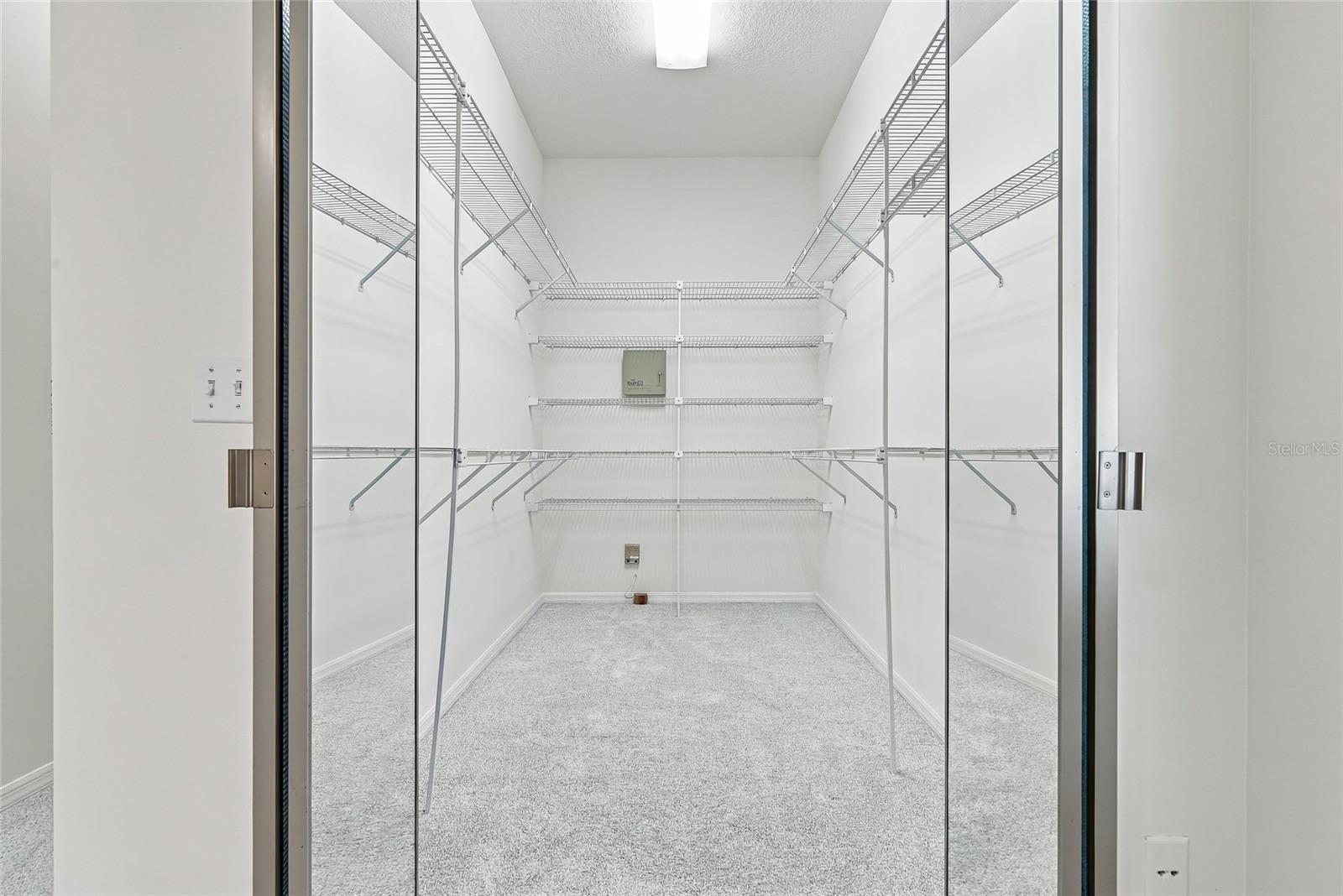 One of two huge closets in the primary bedroom. - 1101 DARLINGTON OAK DR NE, ST PETERSBURG
