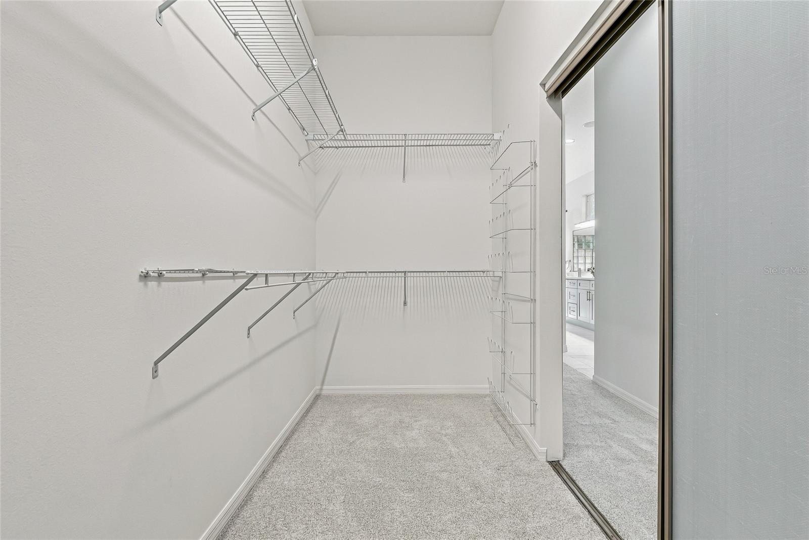 Two of two huge closets in the primary bedroom. - 1101 DARLINGTON OAK DR NE, ST PETERSBURG