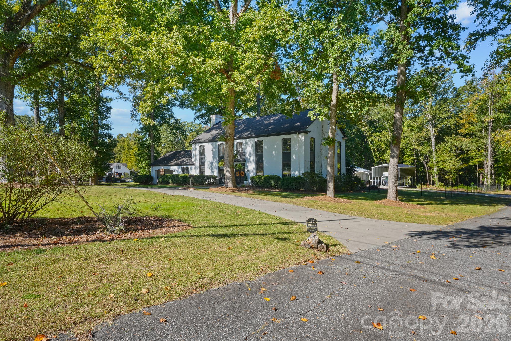 Front Right View- Circle Drive and paved Road to the Back Circle Drive - 319 N Zion Street, Landis