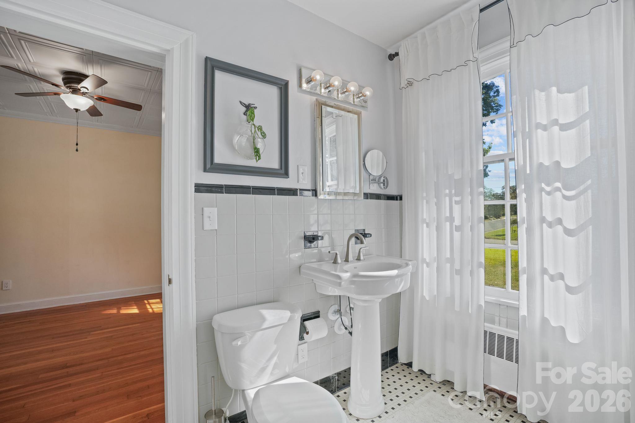 Another View of the Updated, Shared Full Bathroom - 319 N Zion Street, Landis