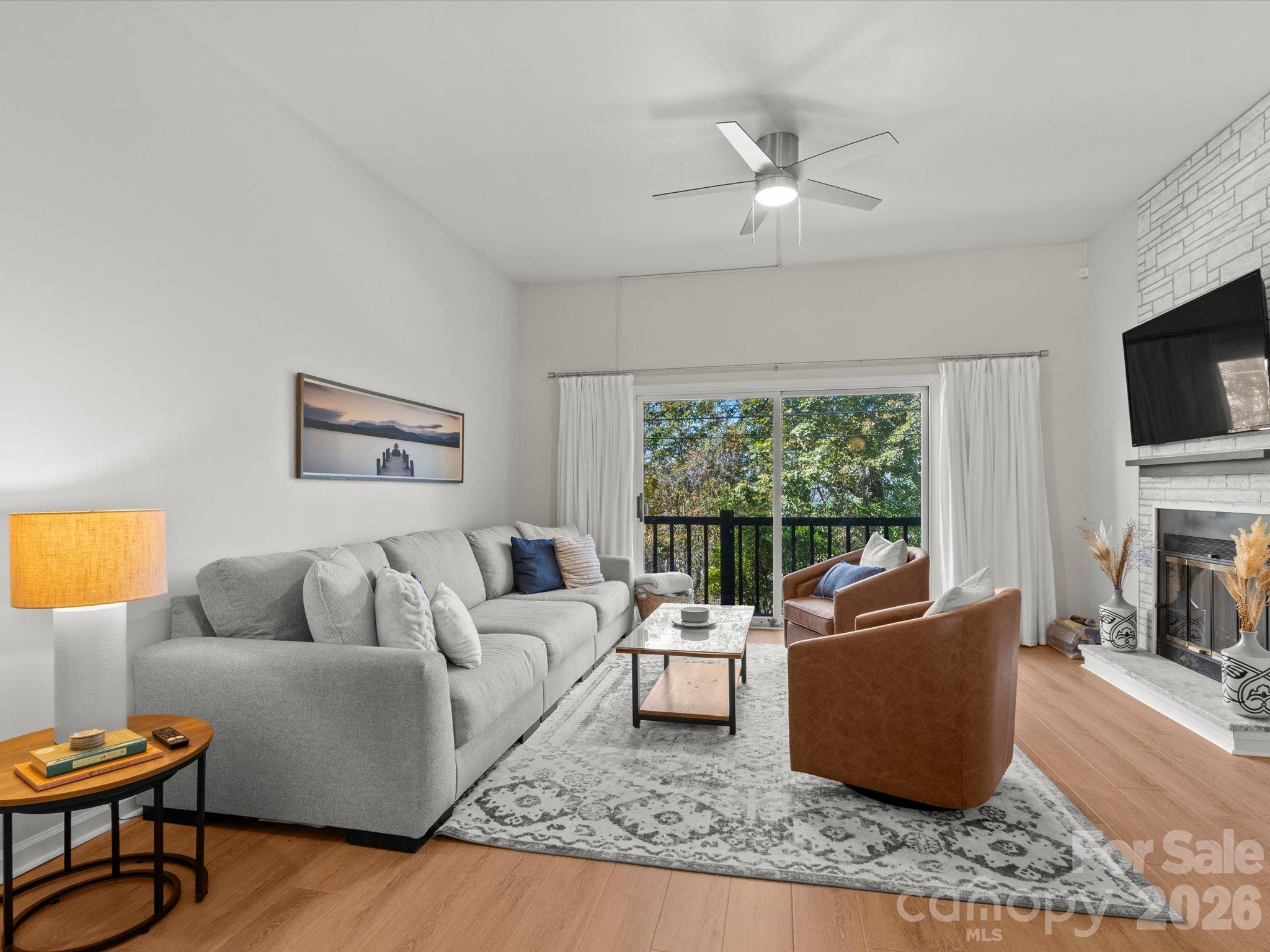 Recent updates include new paint, flooring, ceiling fans, and window treatments - 524 Windswept Drive, Asheville