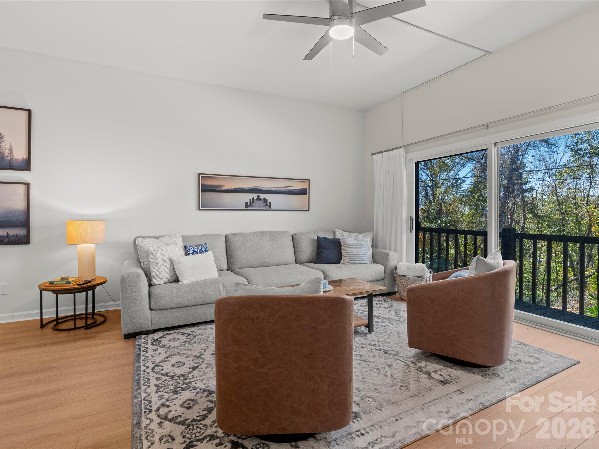 A large patio door brings in natural light - 524 Windswept Drive, Asheville