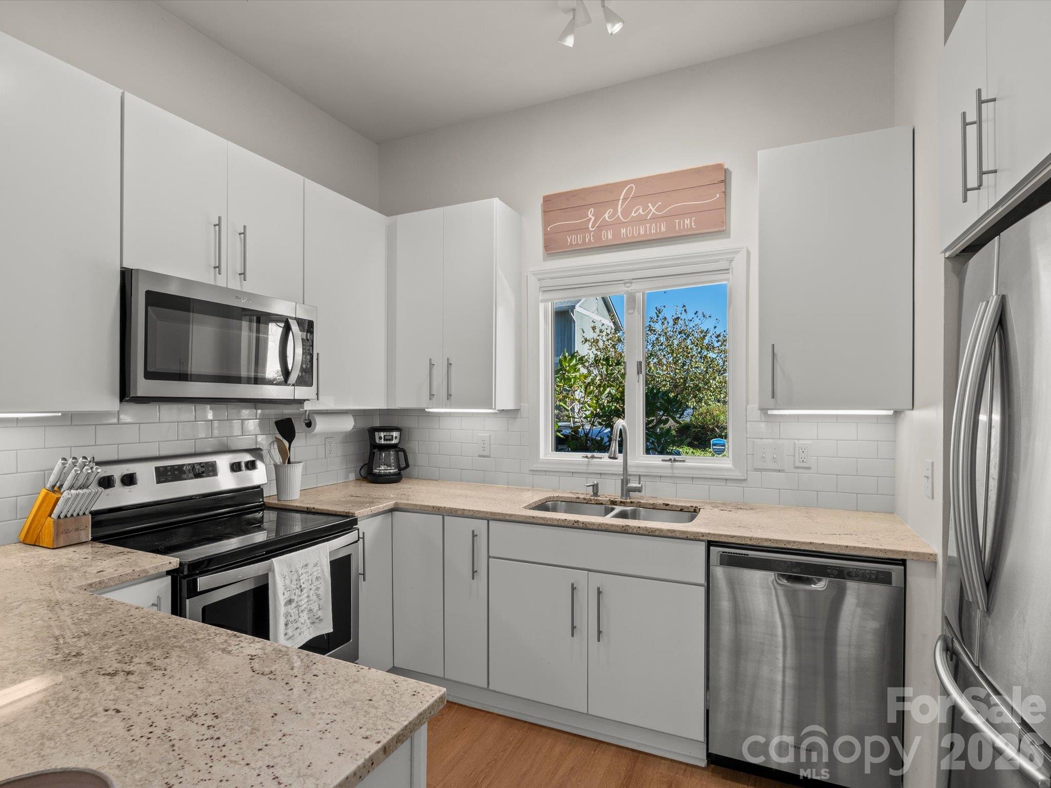 Stainless steel appliances in the kitchen - 524 Windswept Drive, Asheville