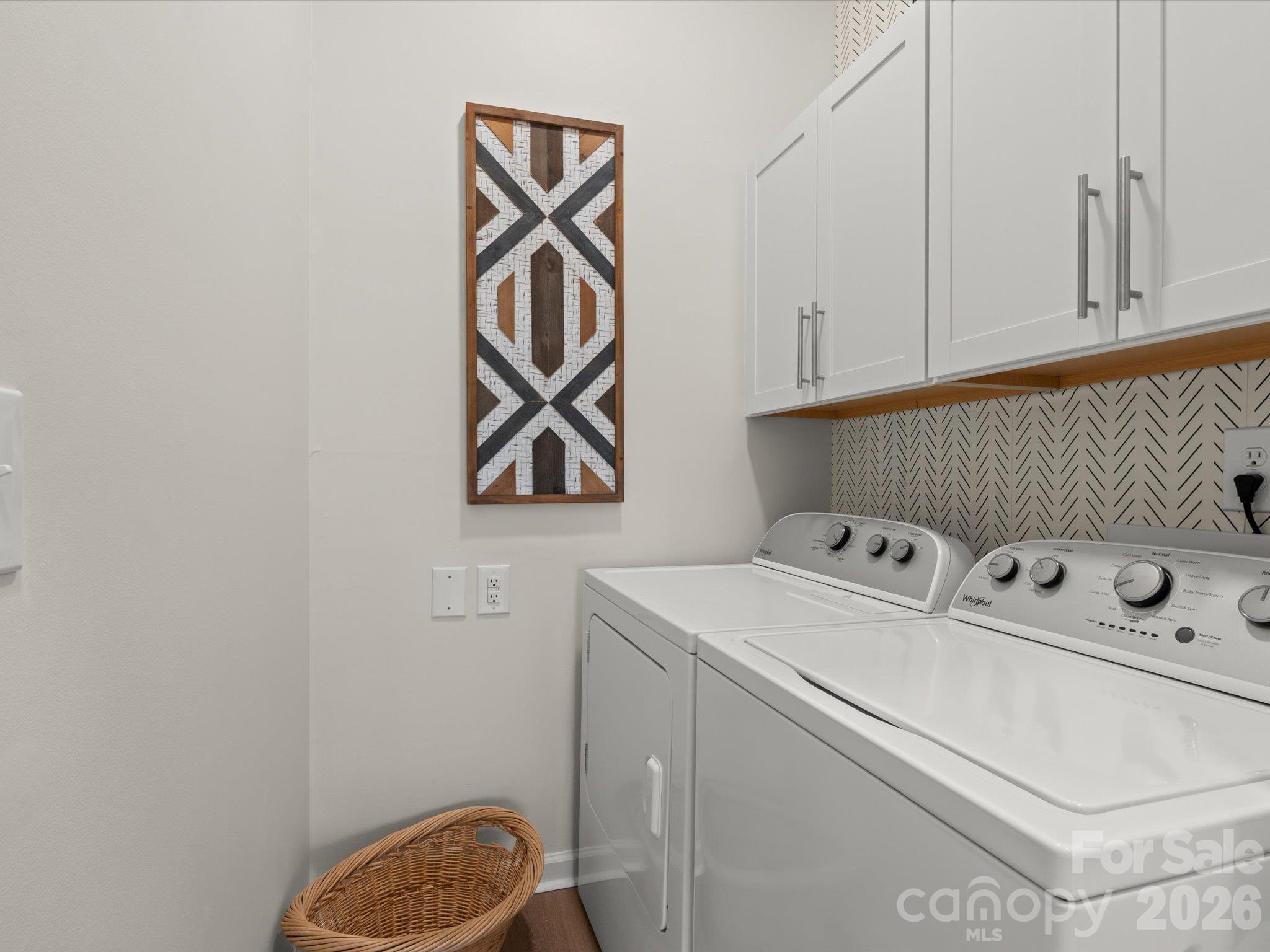 The dedicated laundry room makes chores a breeze - 524 Windswept Drive, Asheville