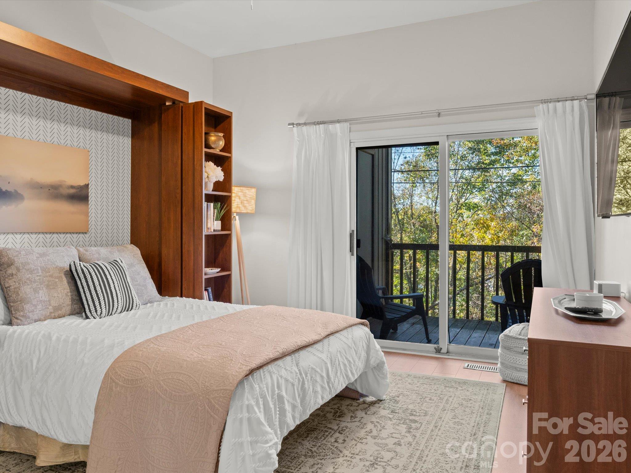 Light fills the room from floor to the tall ceilings - 524 Windswept Drive, Asheville