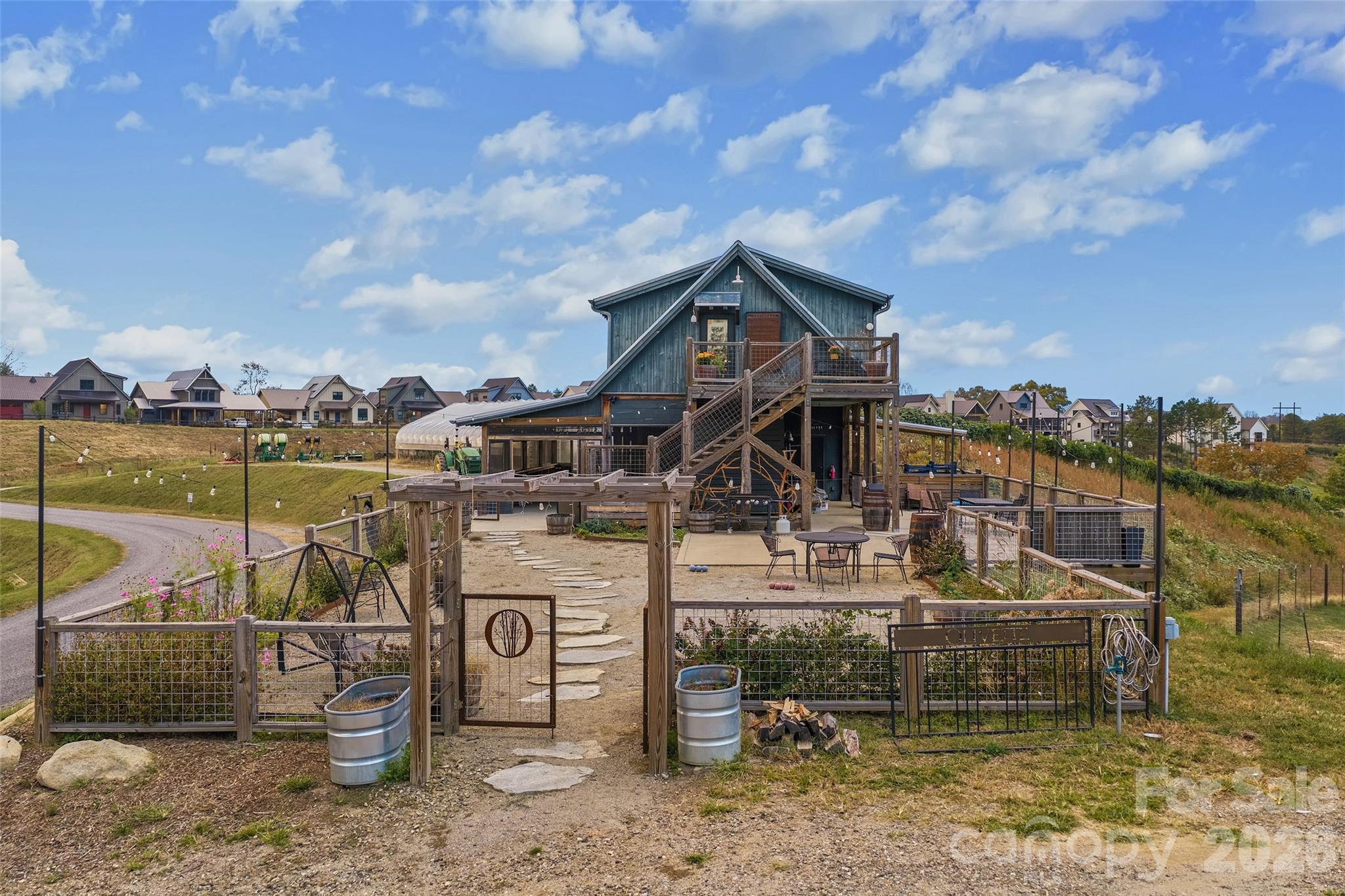 Olivette farmstand and offices with community cookout area - 15 French Broad River Way, Asheville