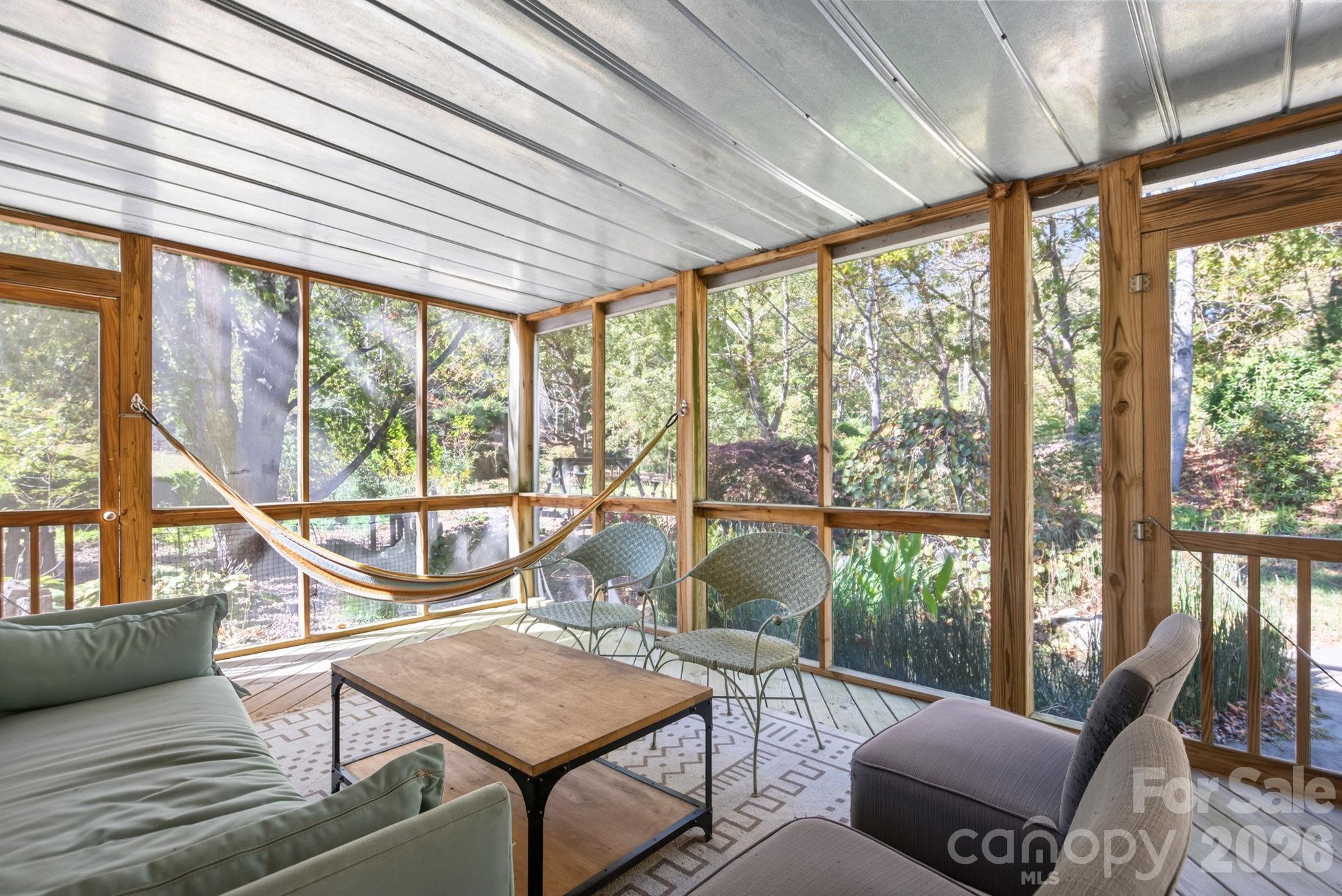 Screened-in Porch Overlooks Koi Pond and Backyard - 414 Old Haw Creek Road, Asheville