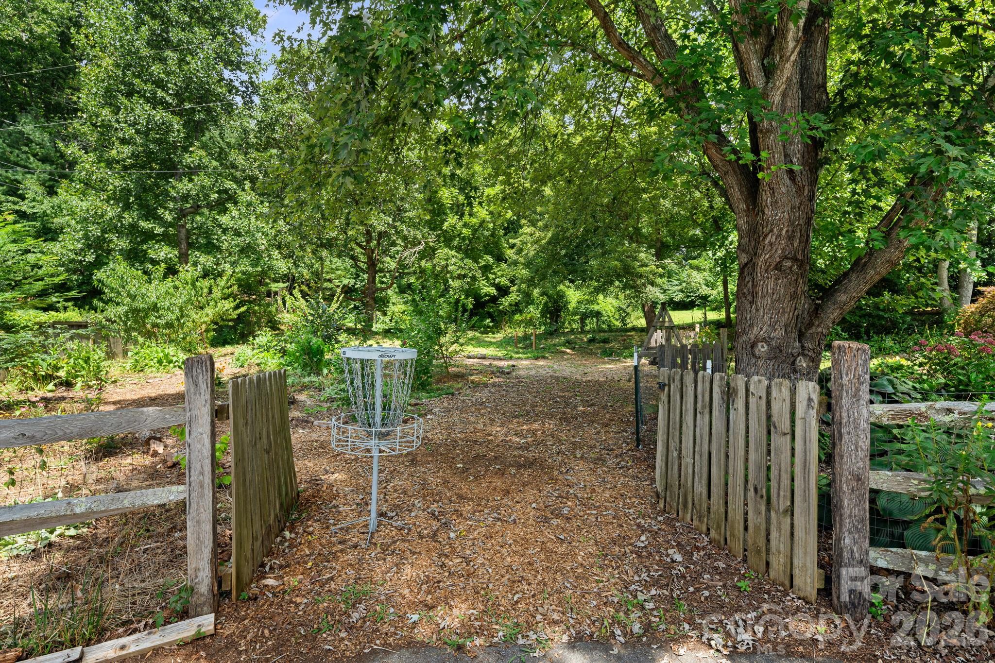 Gate Opens to Backyard - 414 Old Haw Creek Road, Asheville