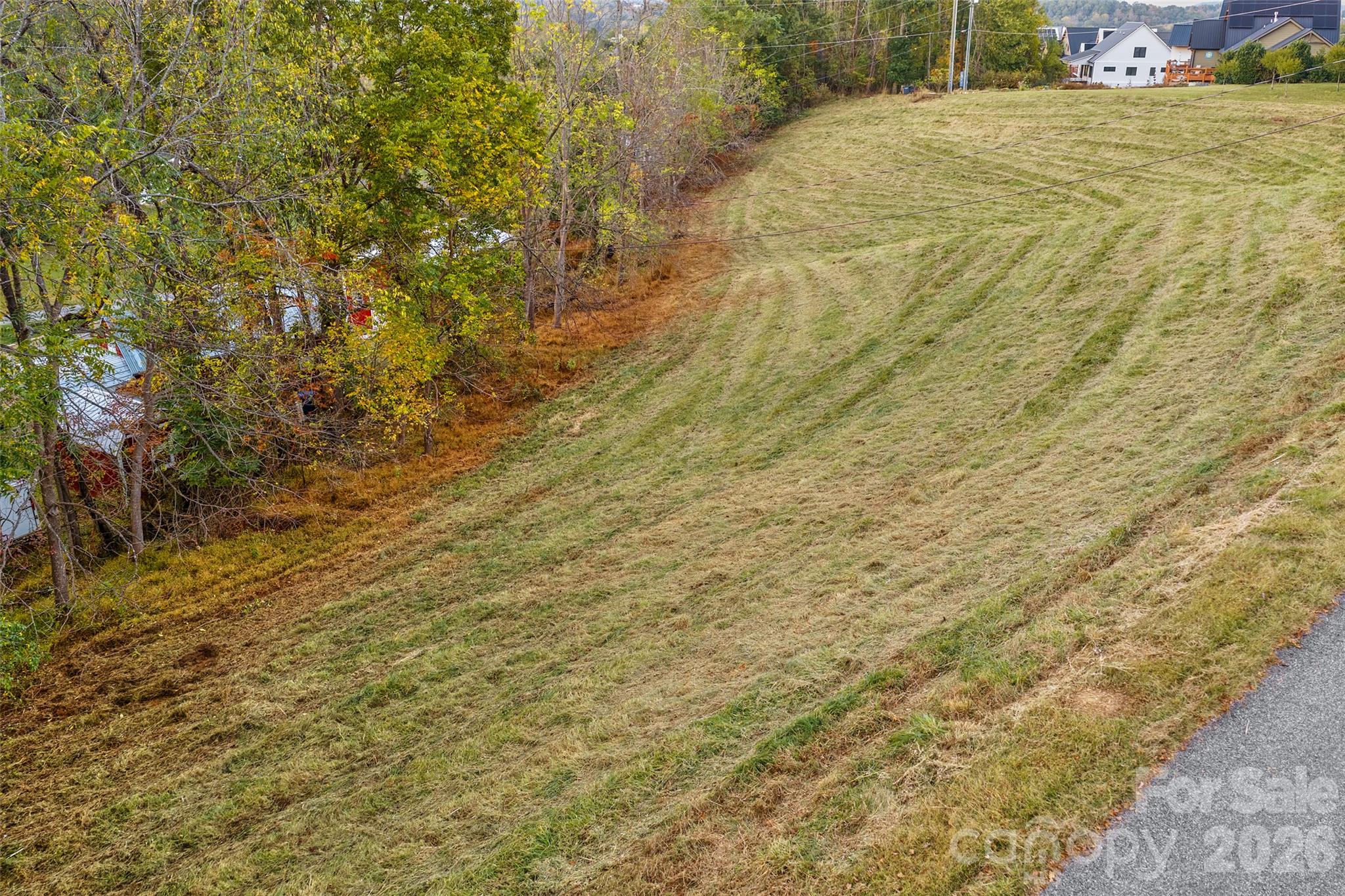 Lot is located in at the entrance to the Westridge section of Olivette - 215 Old Macedonia Road, Asheville