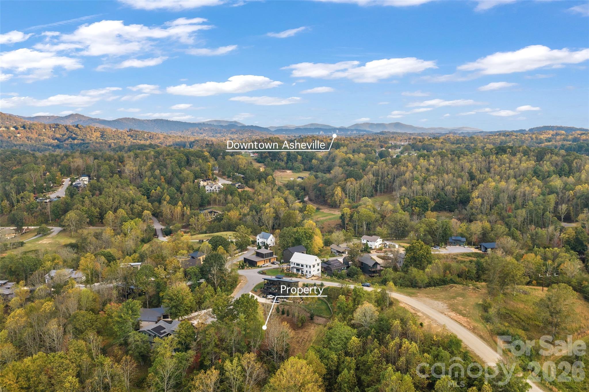 Aerial of property showing proximity to downtown Asheville - 404 Blue Mind Way, Asheville