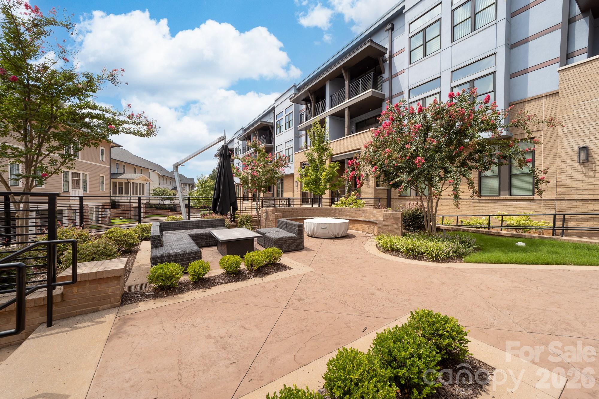 Courtyard with a fire pit and sitting areas - 2401 Euclid Avenue, Charlotte