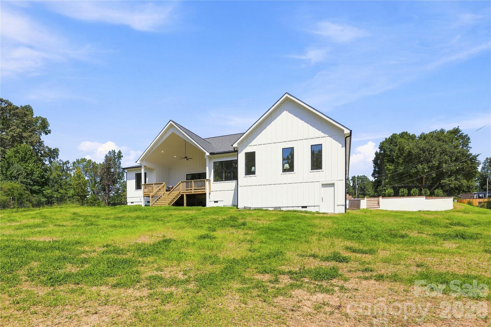 Back covered deck shown as included feature - 509 Simpson Road, Locust