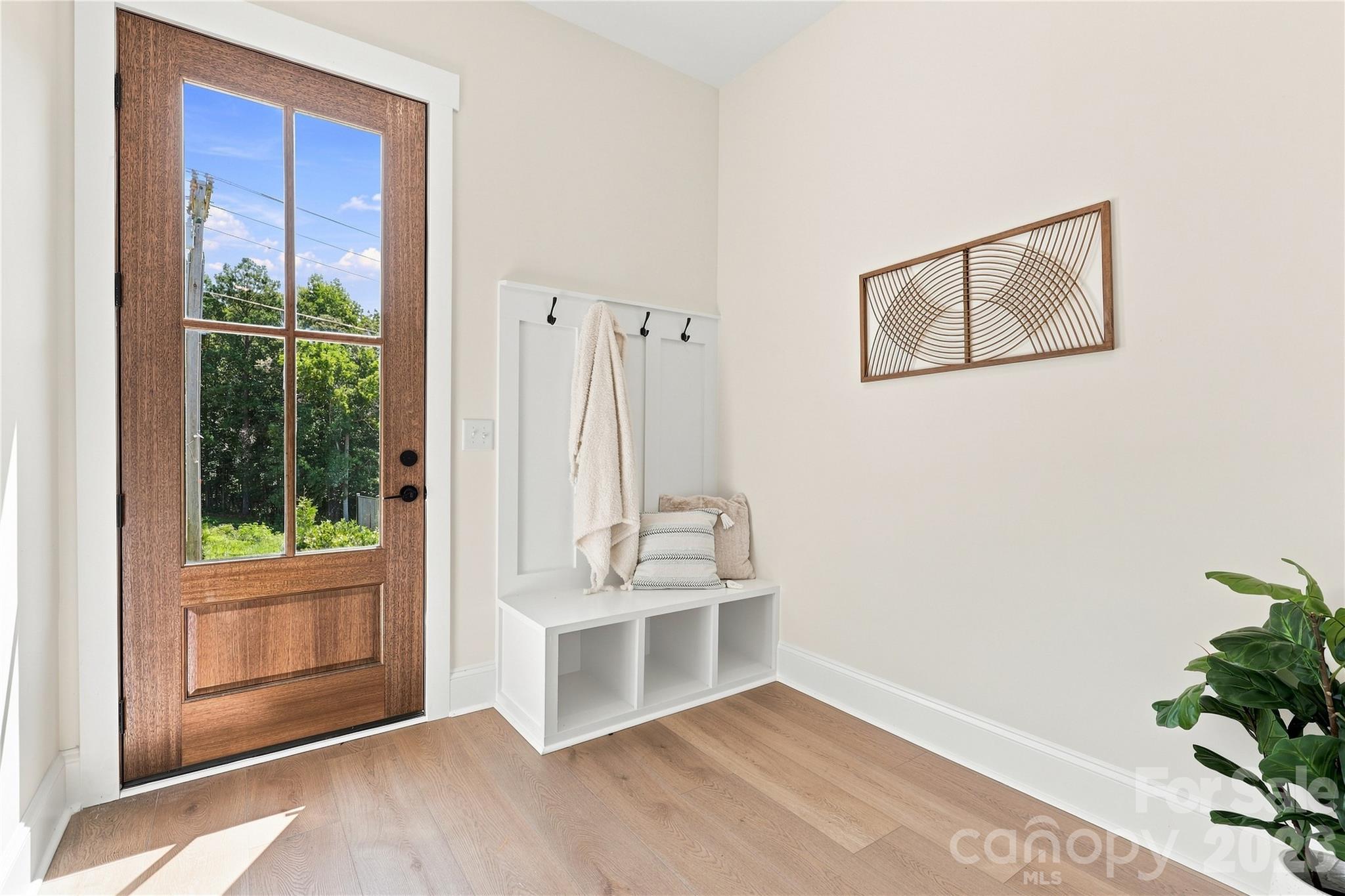 Mudroom w/drop zone (this is a side-entrance door) Shown with included features - 509 Simpson Road, Locust