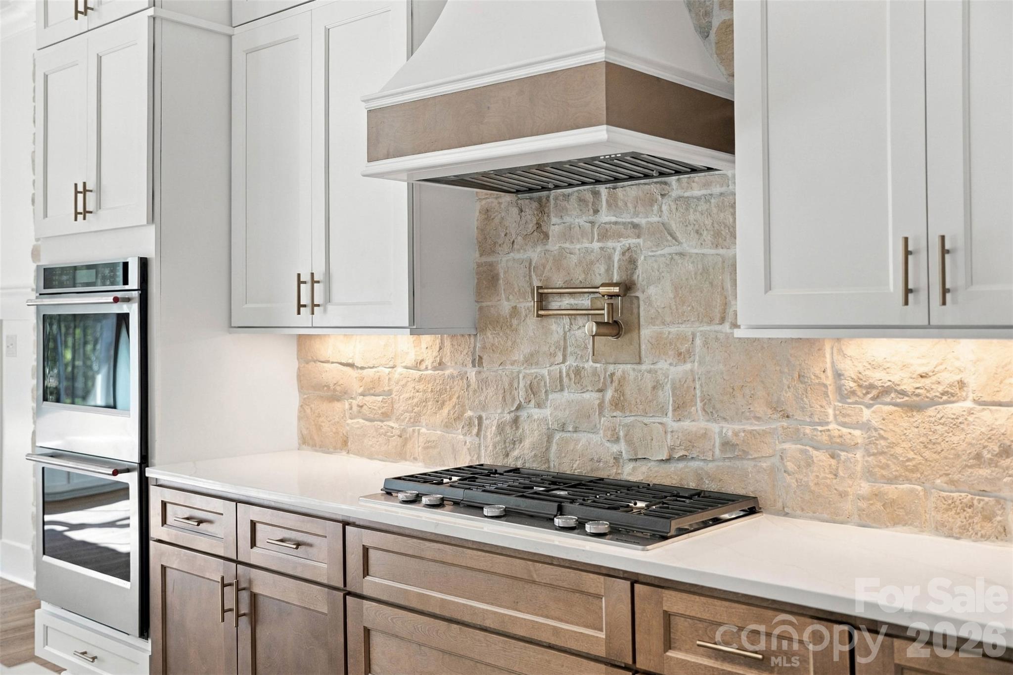 Previously built Arbor with optional stone accents in kitchen - 509 Simpson Road, Locust